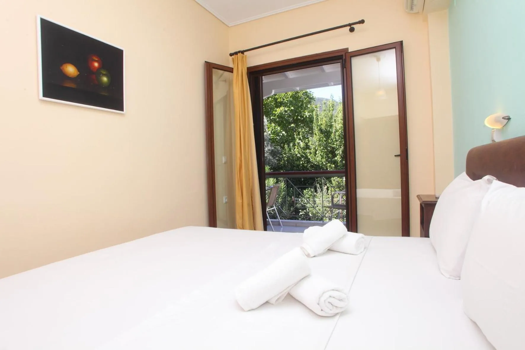 Bed in Vicky Apartments