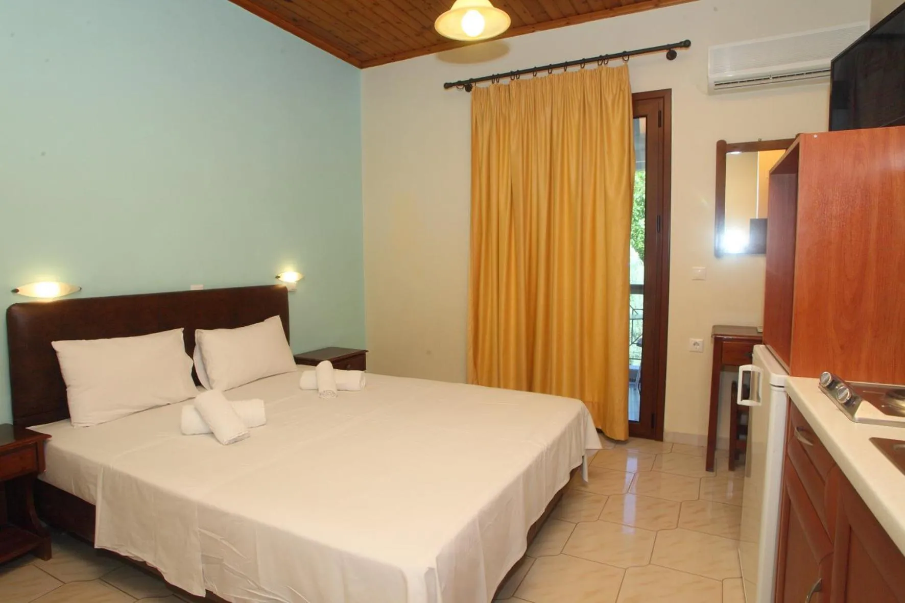 Bed in Vicky Apartments
