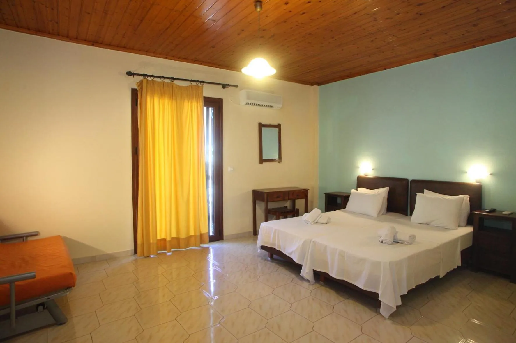 Bed in Vicky Apartments