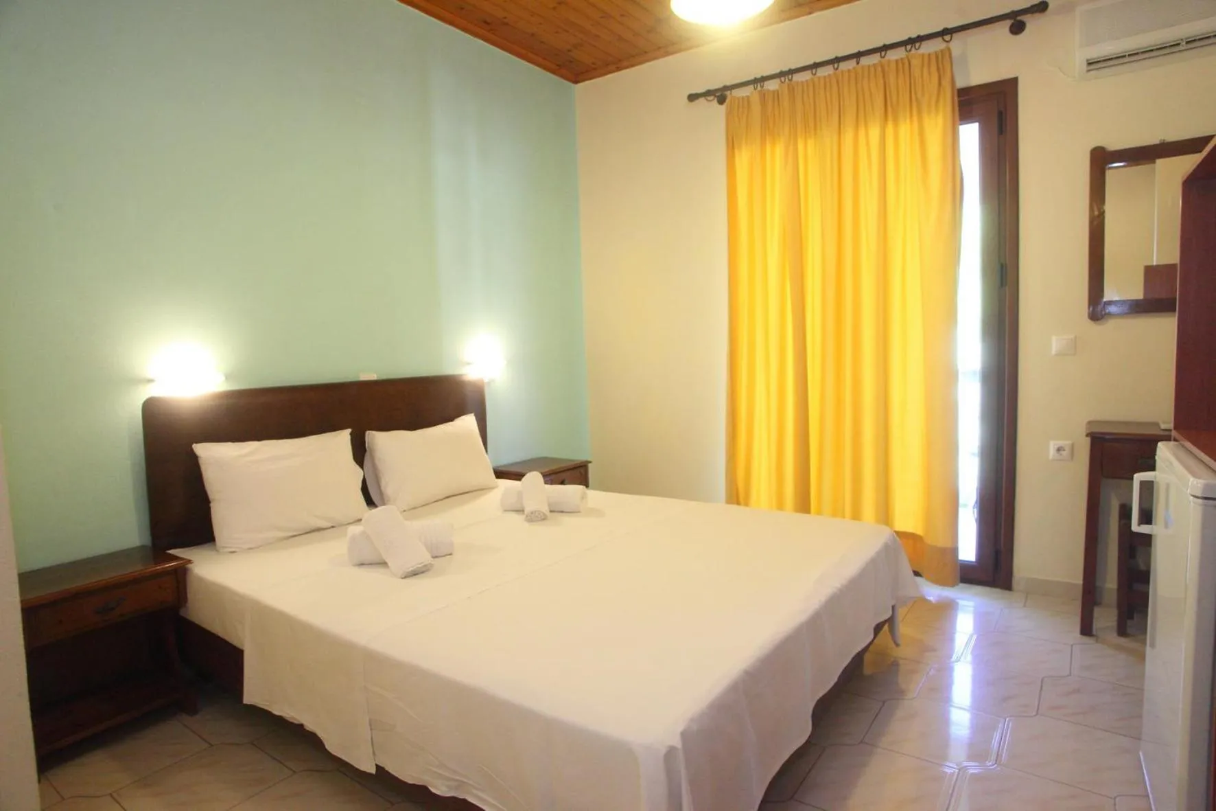Bed in Vicky Apartments