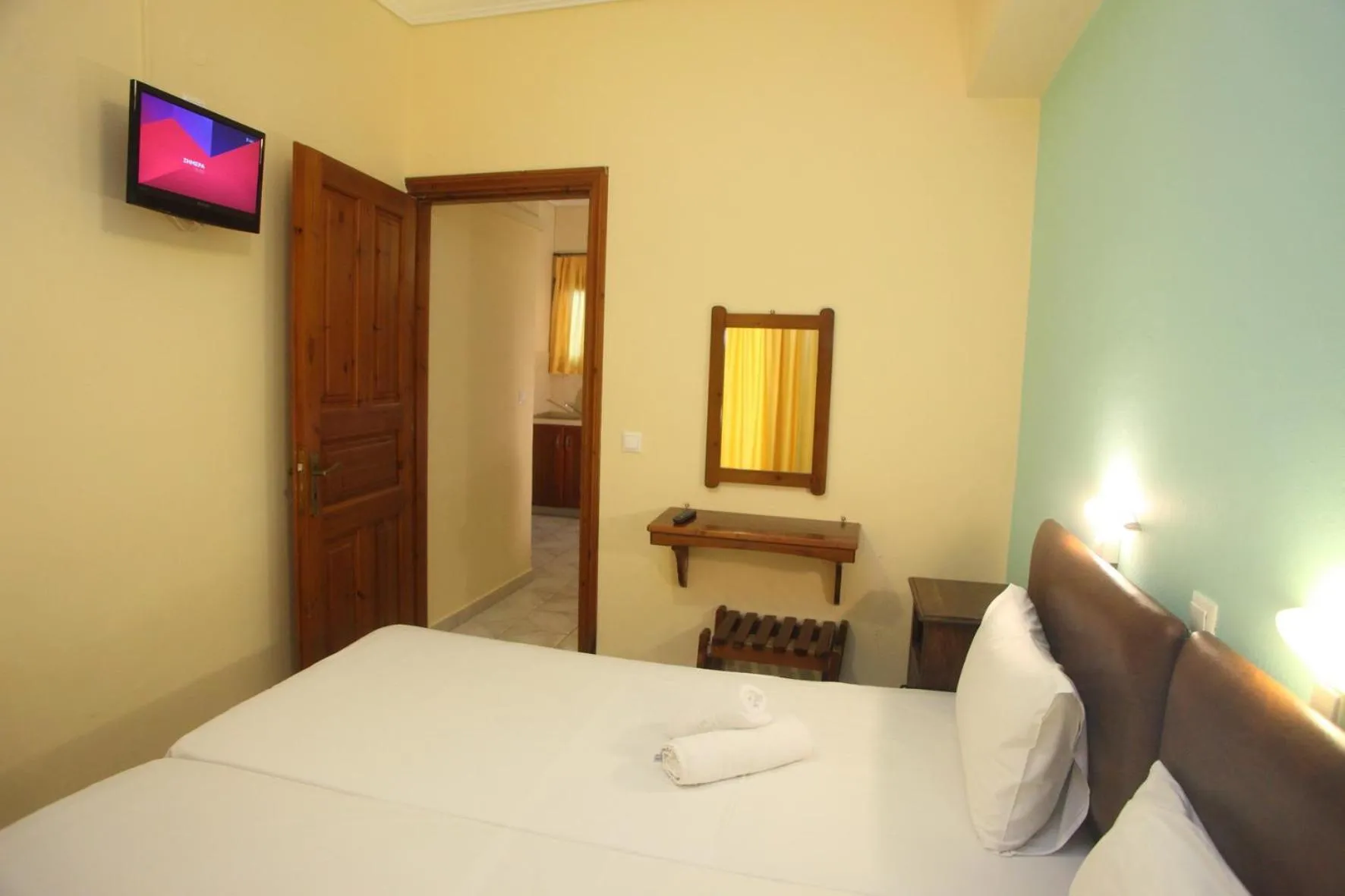 Bed in Vicky Apartments
