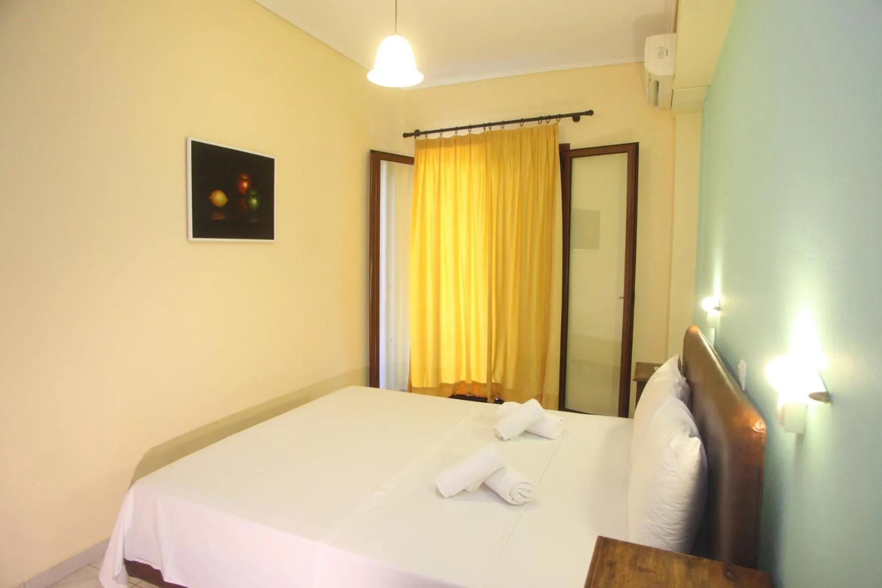 Bed in Vicky Apartments