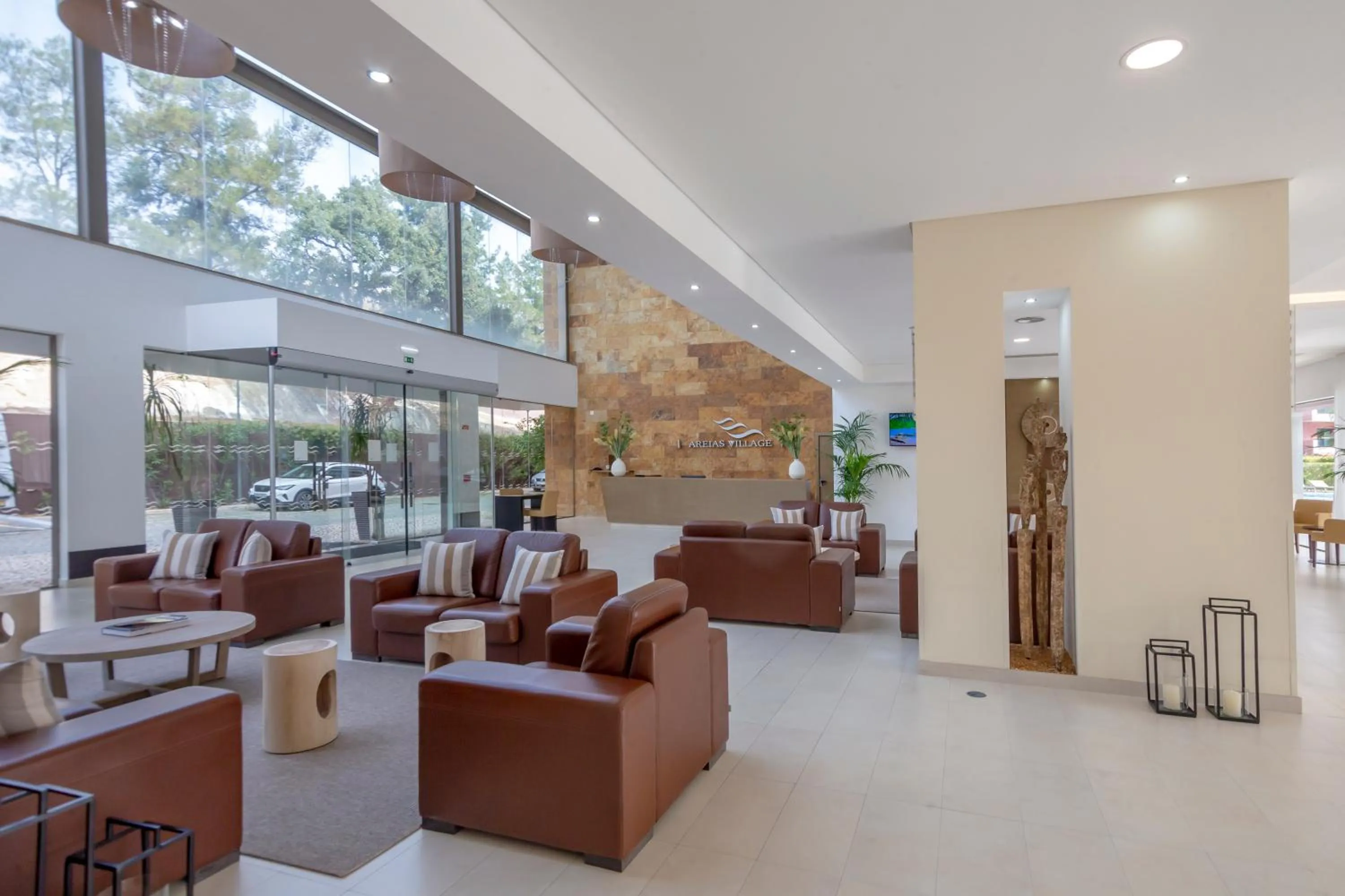 Lobby or reception in Areias Village Beach Suite Hotel