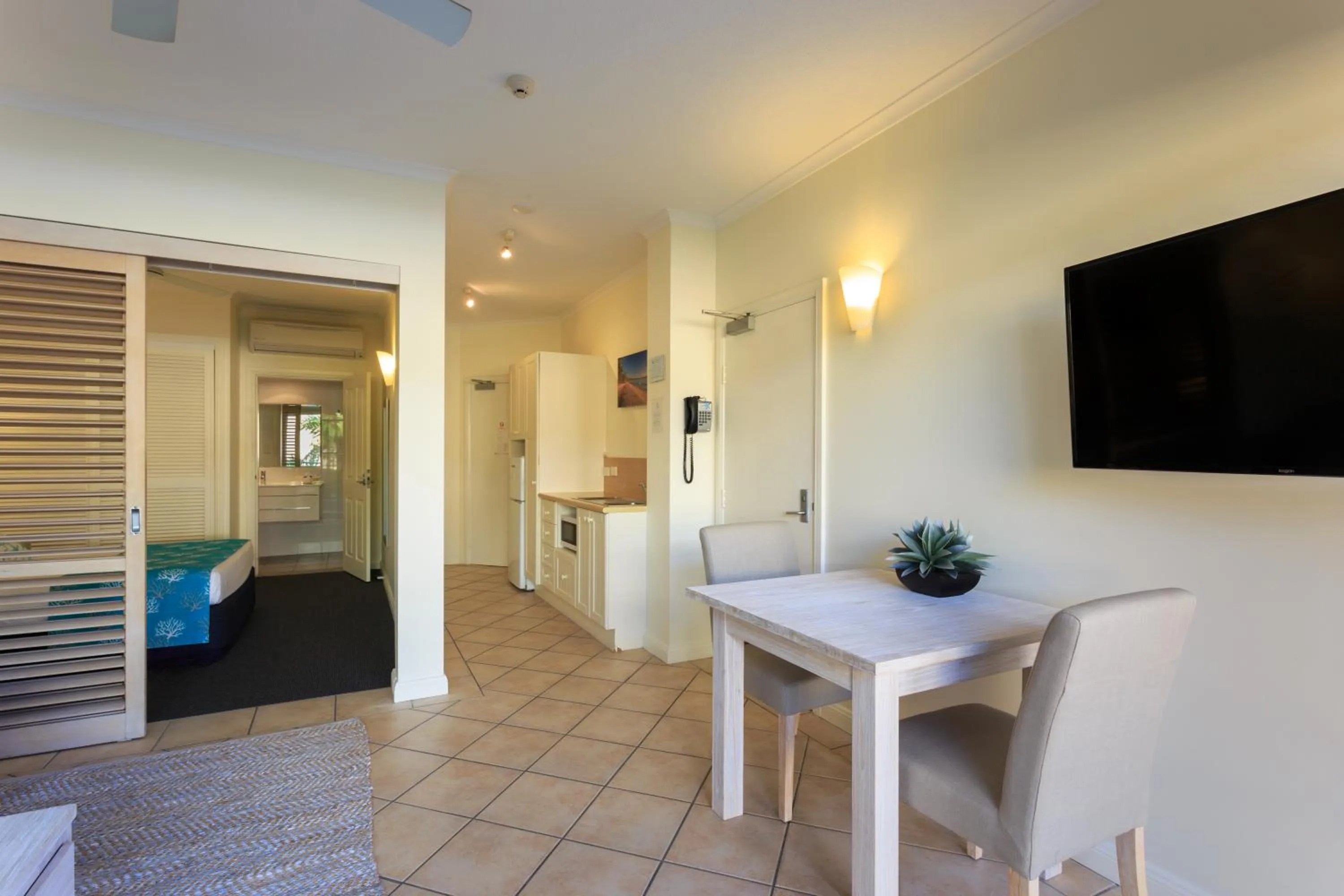Kitchen or kitchenette in Macrossan House Boutique Holiday Apartments