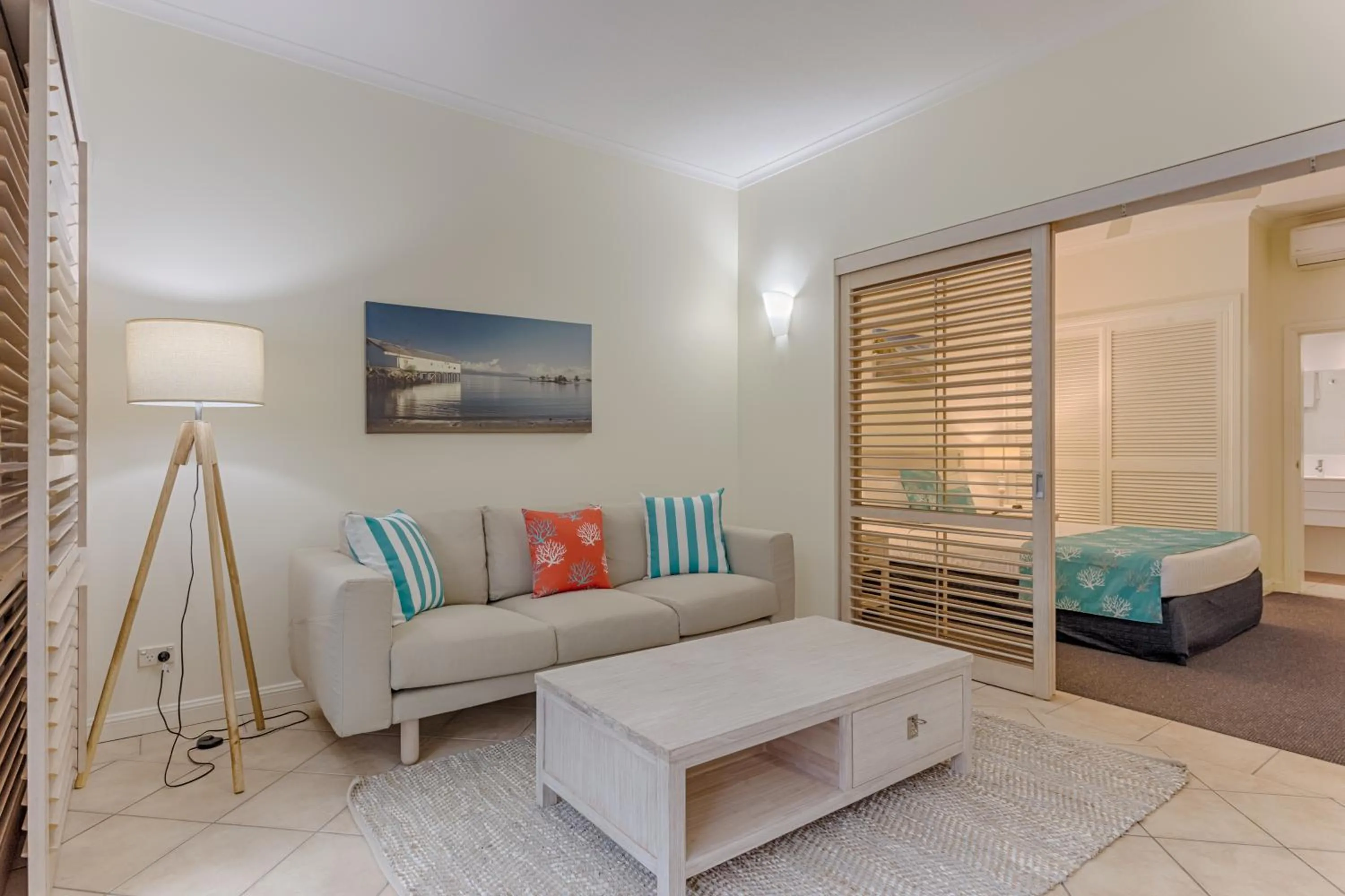 Living room, Bed in Macrossan House Boutique Holiday Apartments