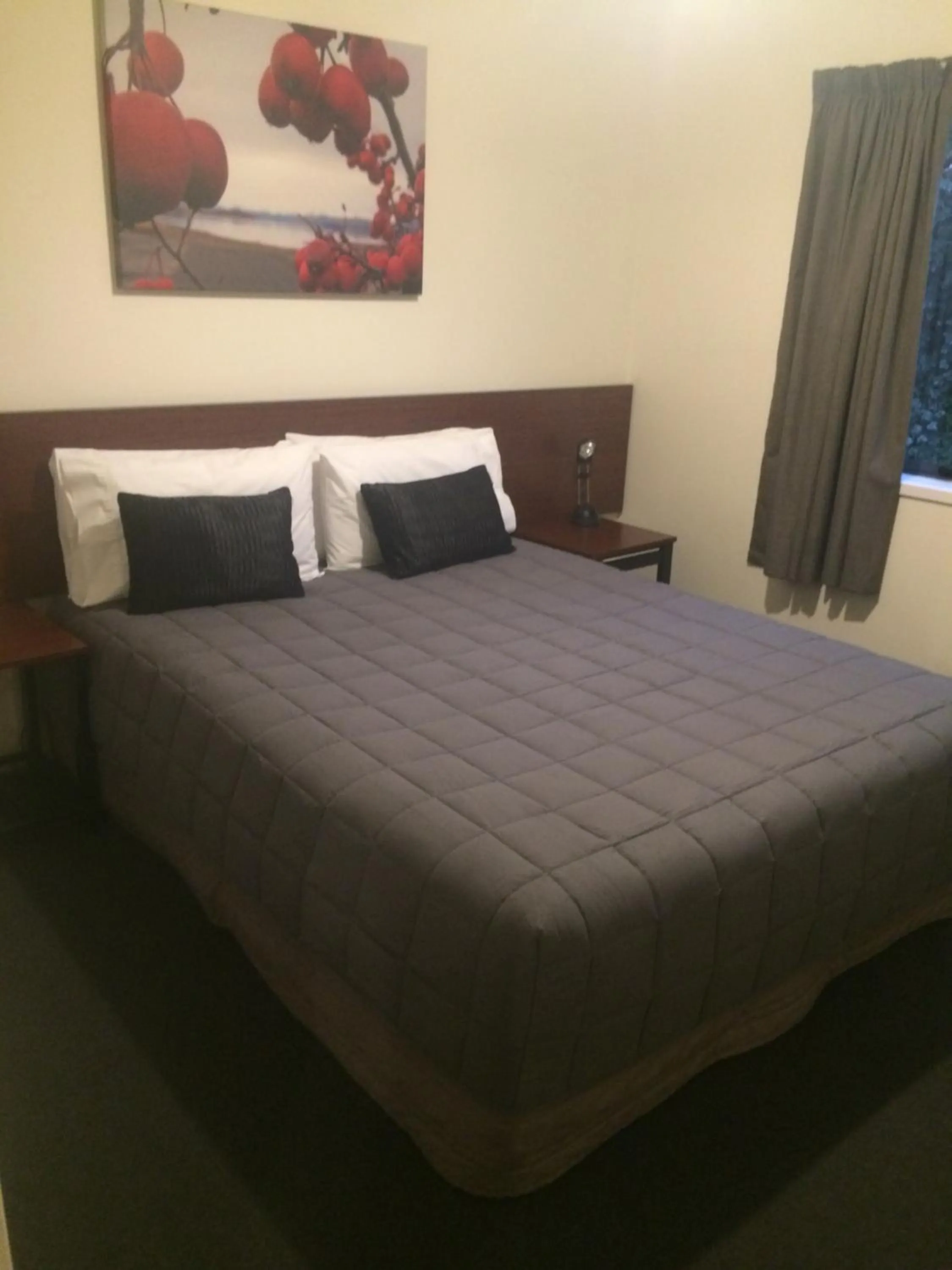 Bed in Sherborne Motor Lodge