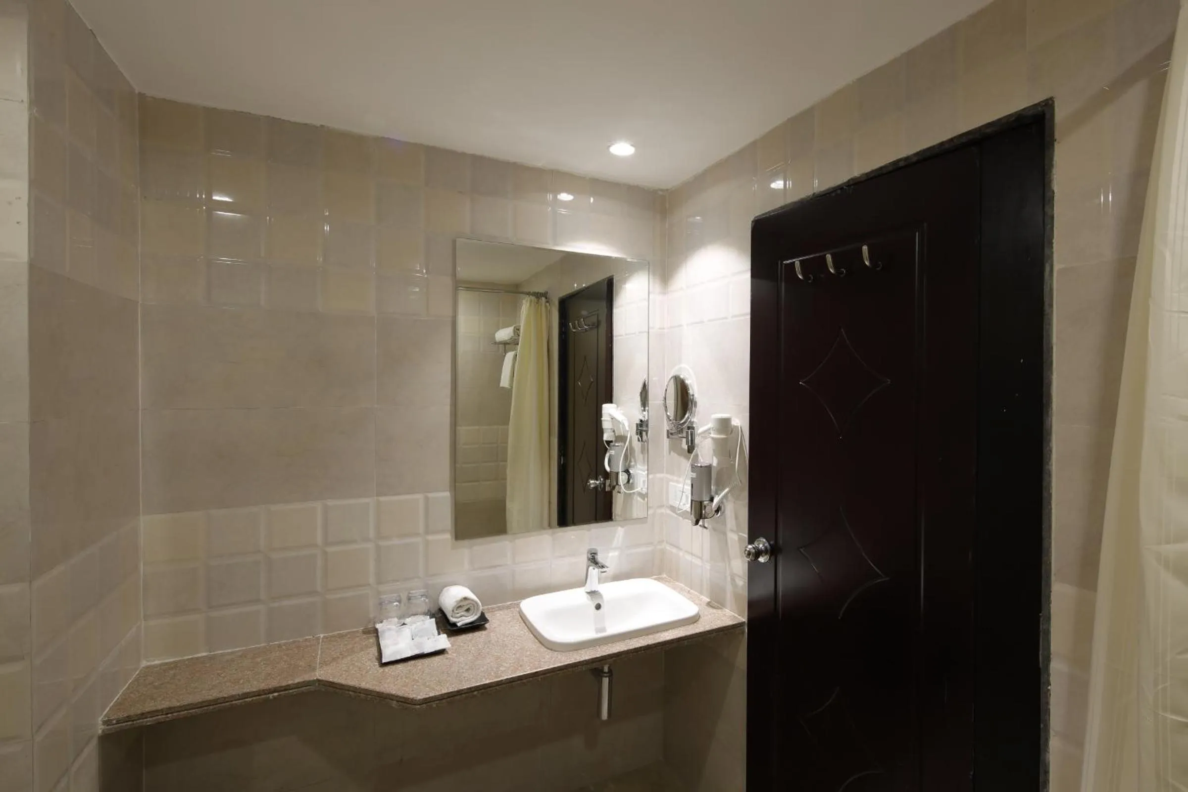 Bathroom in Regenta Inn Ranip Ahmedabad