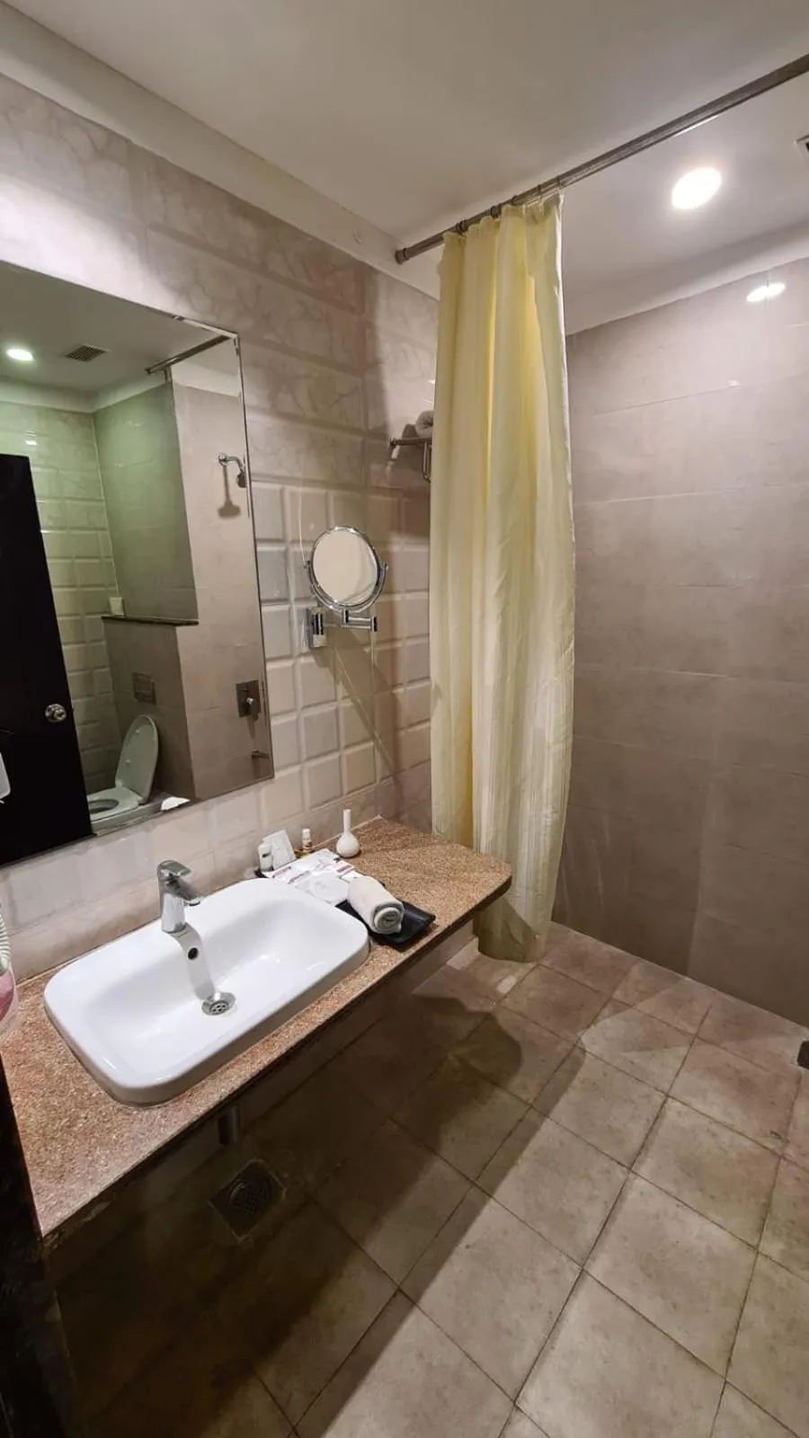 Toilet in Regenta Inn Ranip Ahmedabad