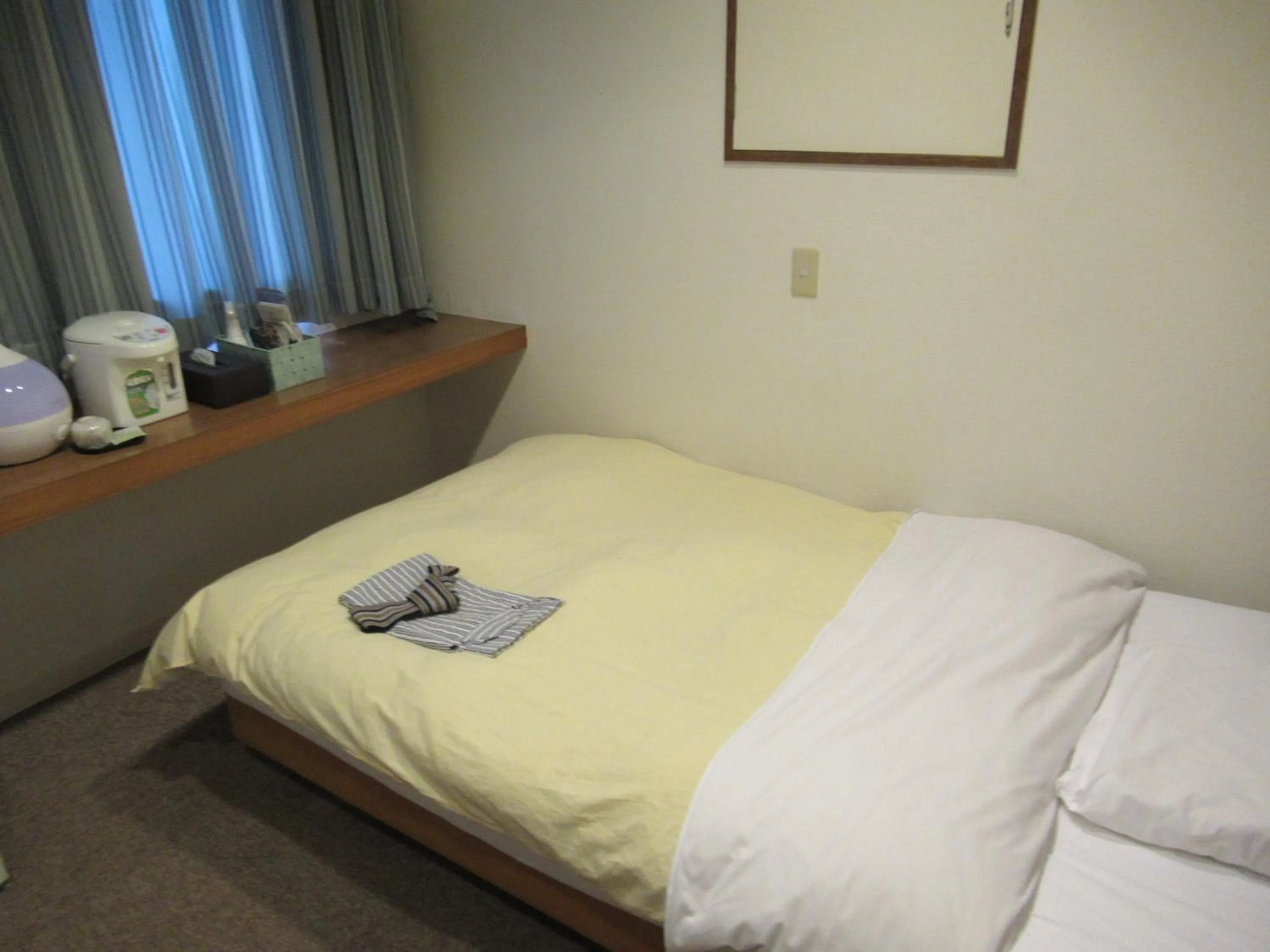 Photo of the whole room, Bed in Hotel Crown Hills Kitami Annex