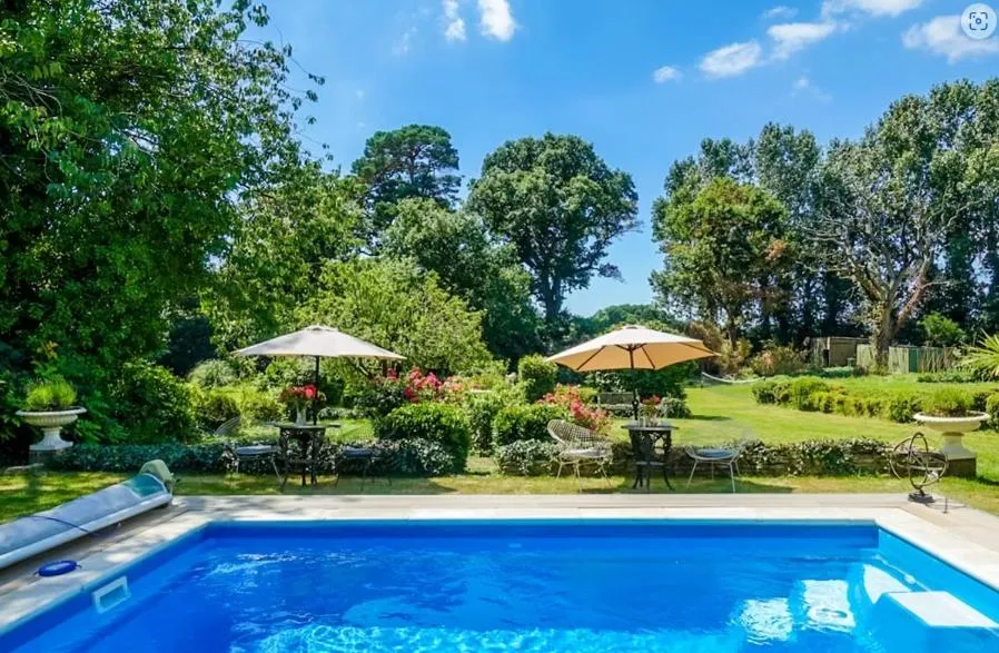 Swimming pool in Cedar House Boutique B&B