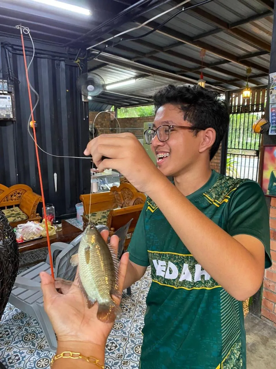Fishing in Dangau Sala D'Kontena