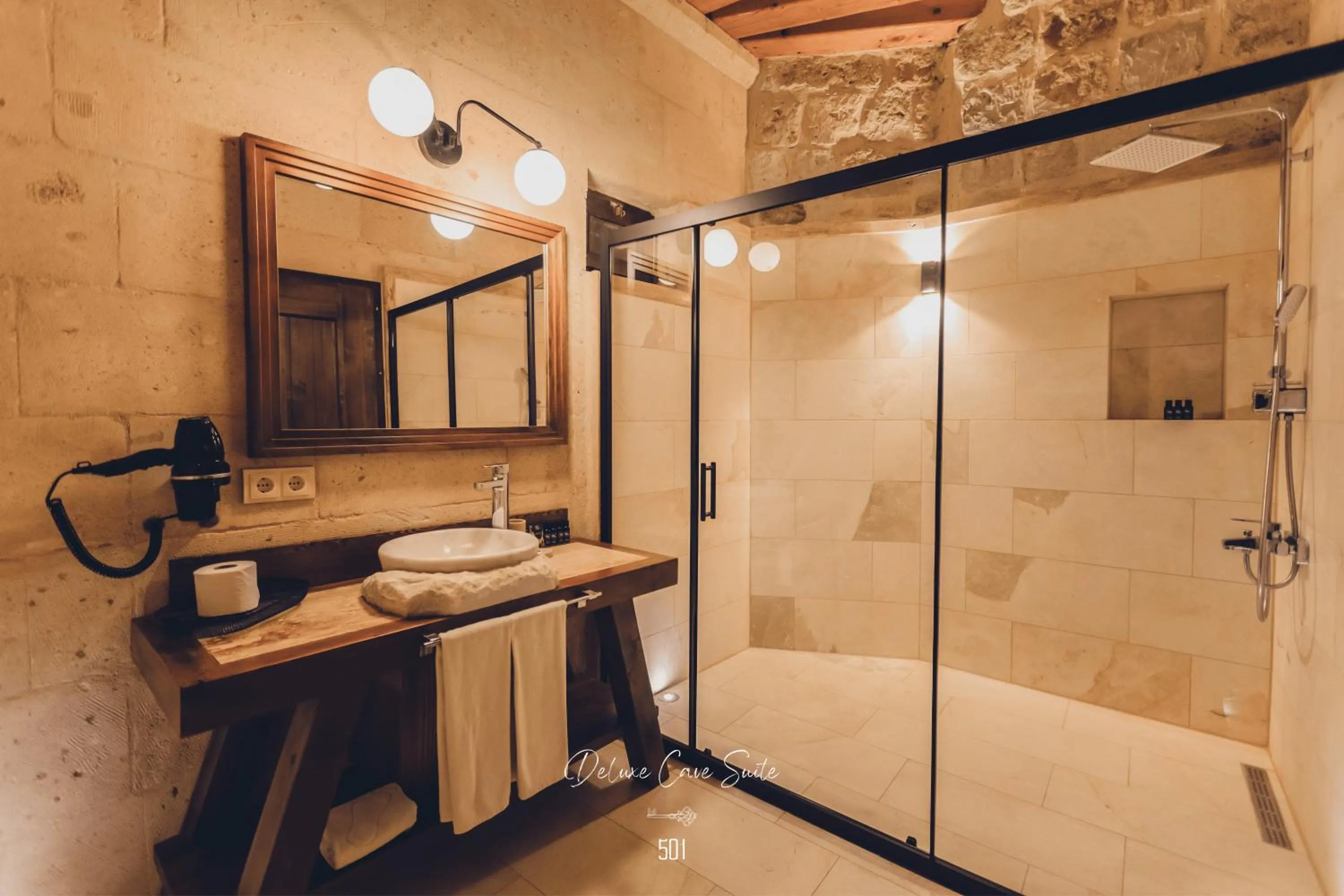 Shower in Nino Cave Suites