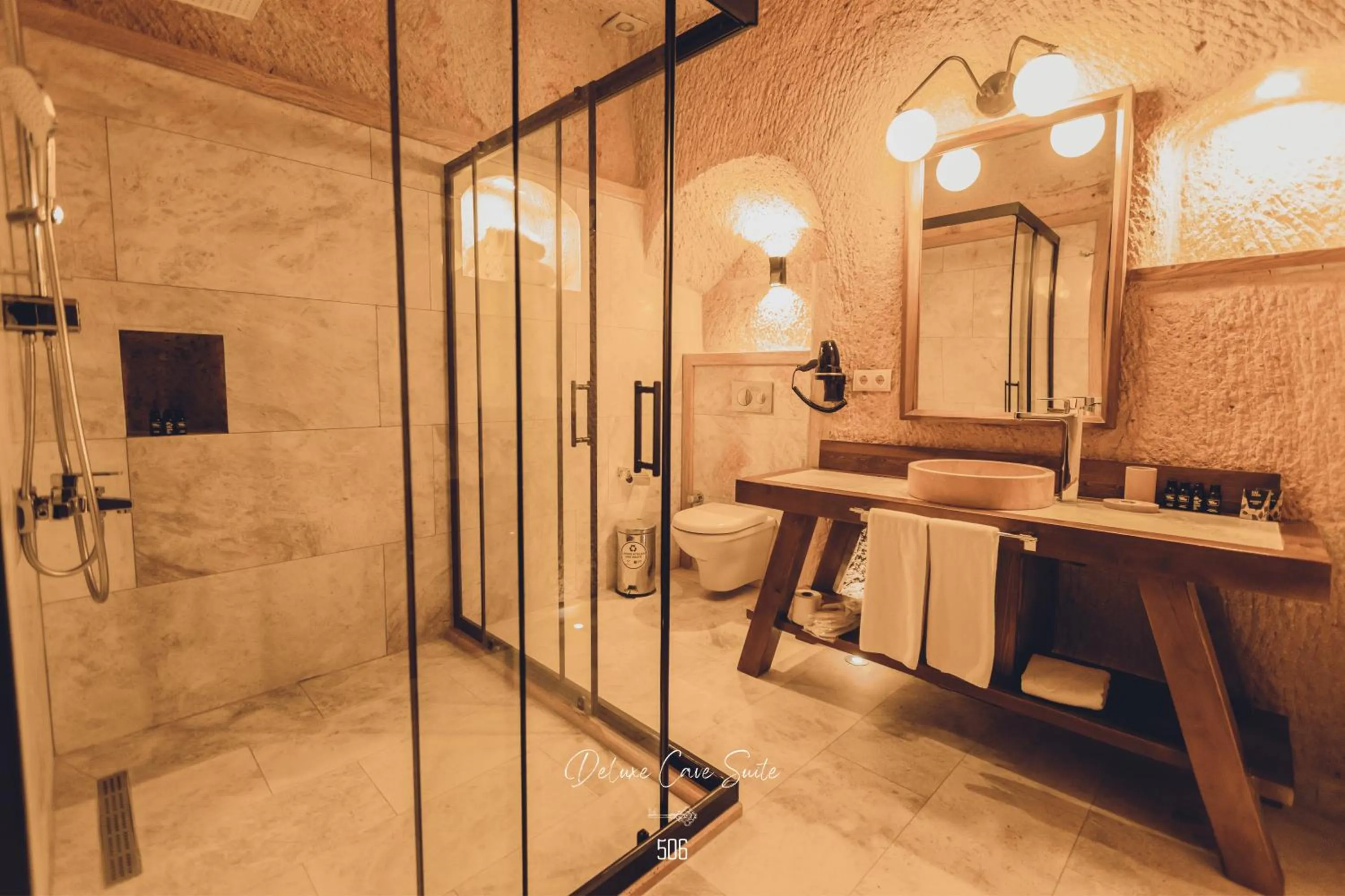 Shower in Nino Cave Suites