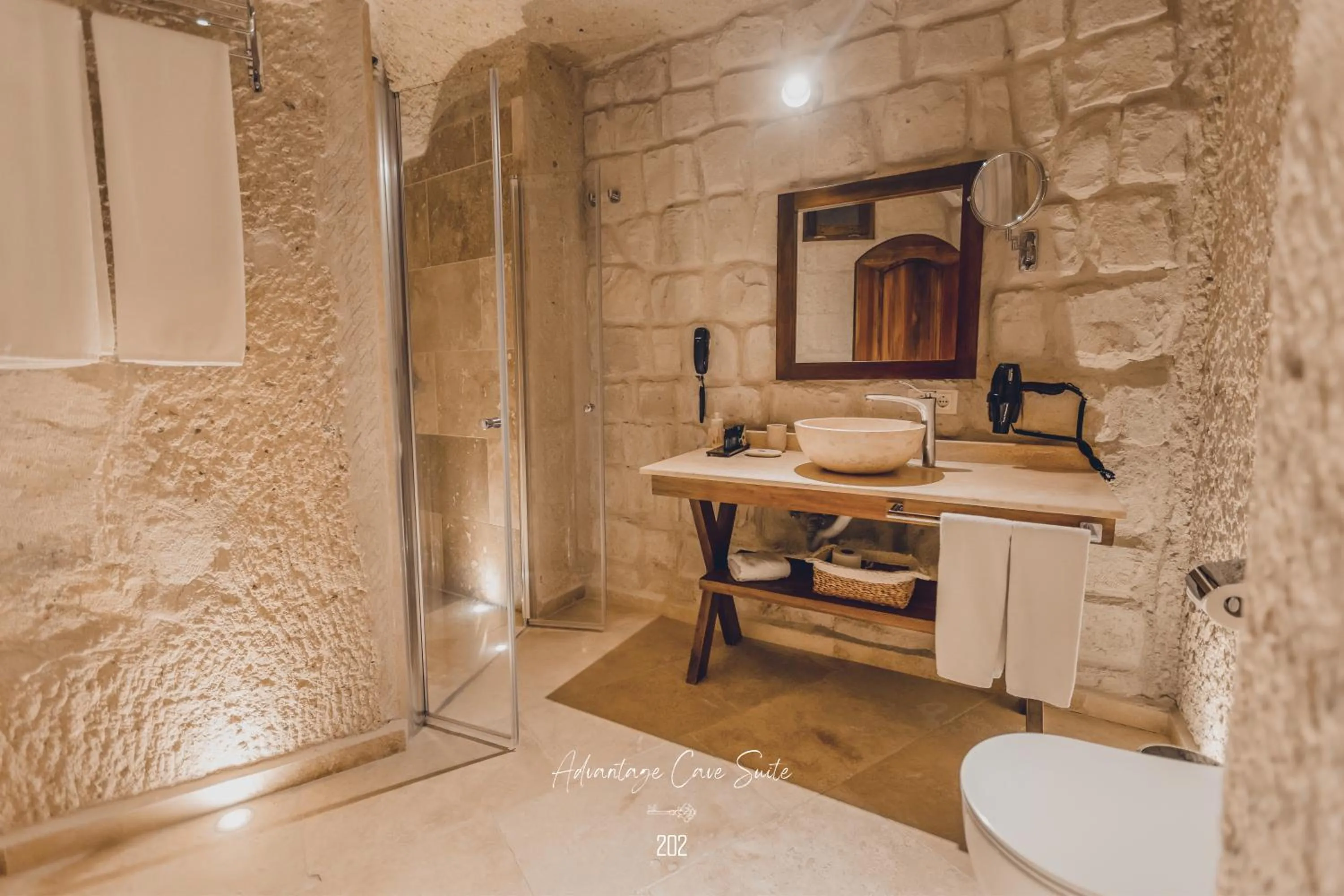 Shower in Nino Cave Suites