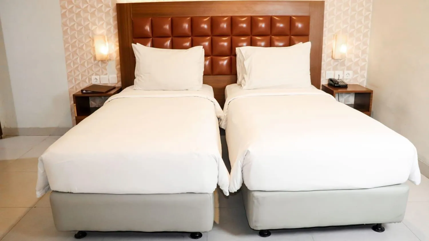 Bed in Pakons Prime Hotel