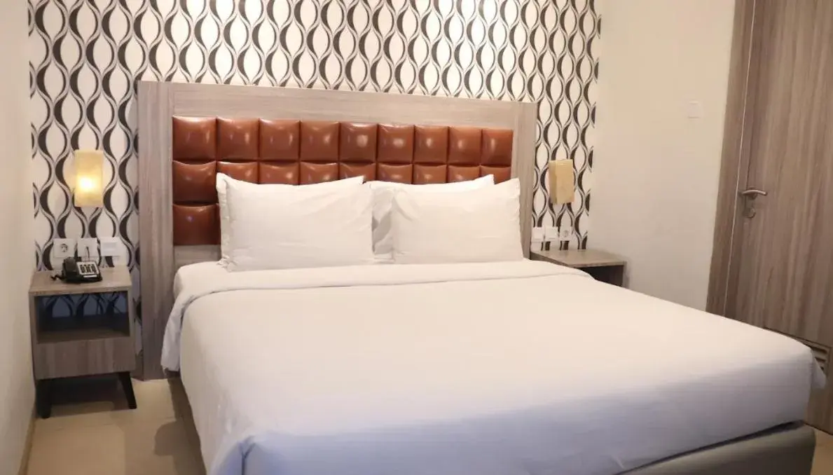 Bed in Pakons Prime Hotel Bed in Pakons Prime Hotel