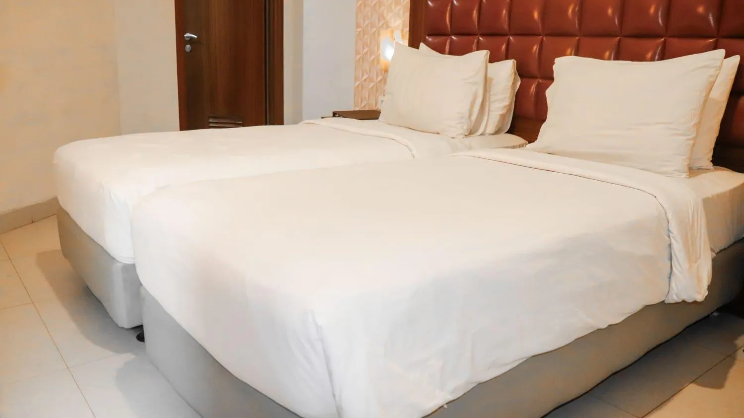 Bed in Pakons Prime Hotel