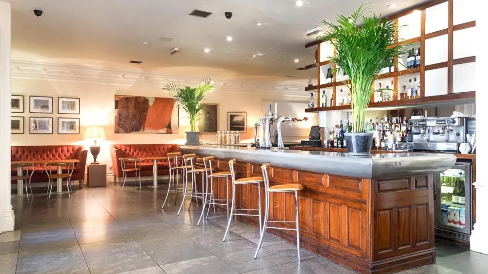 Lounge or bar in The Racquet Club