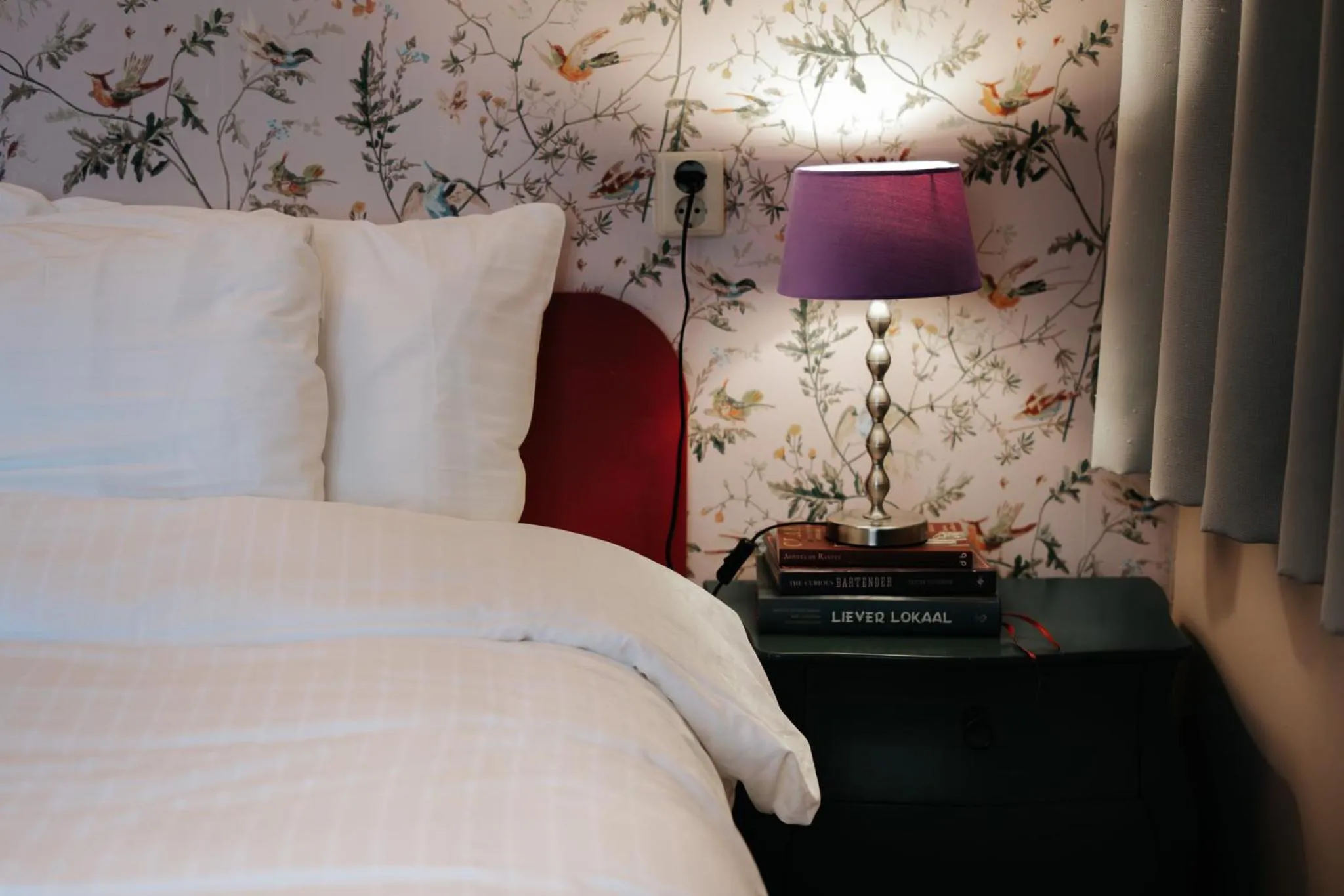 Bed in Rosalia's Menagerie Cocktail bar & InnUpstairs