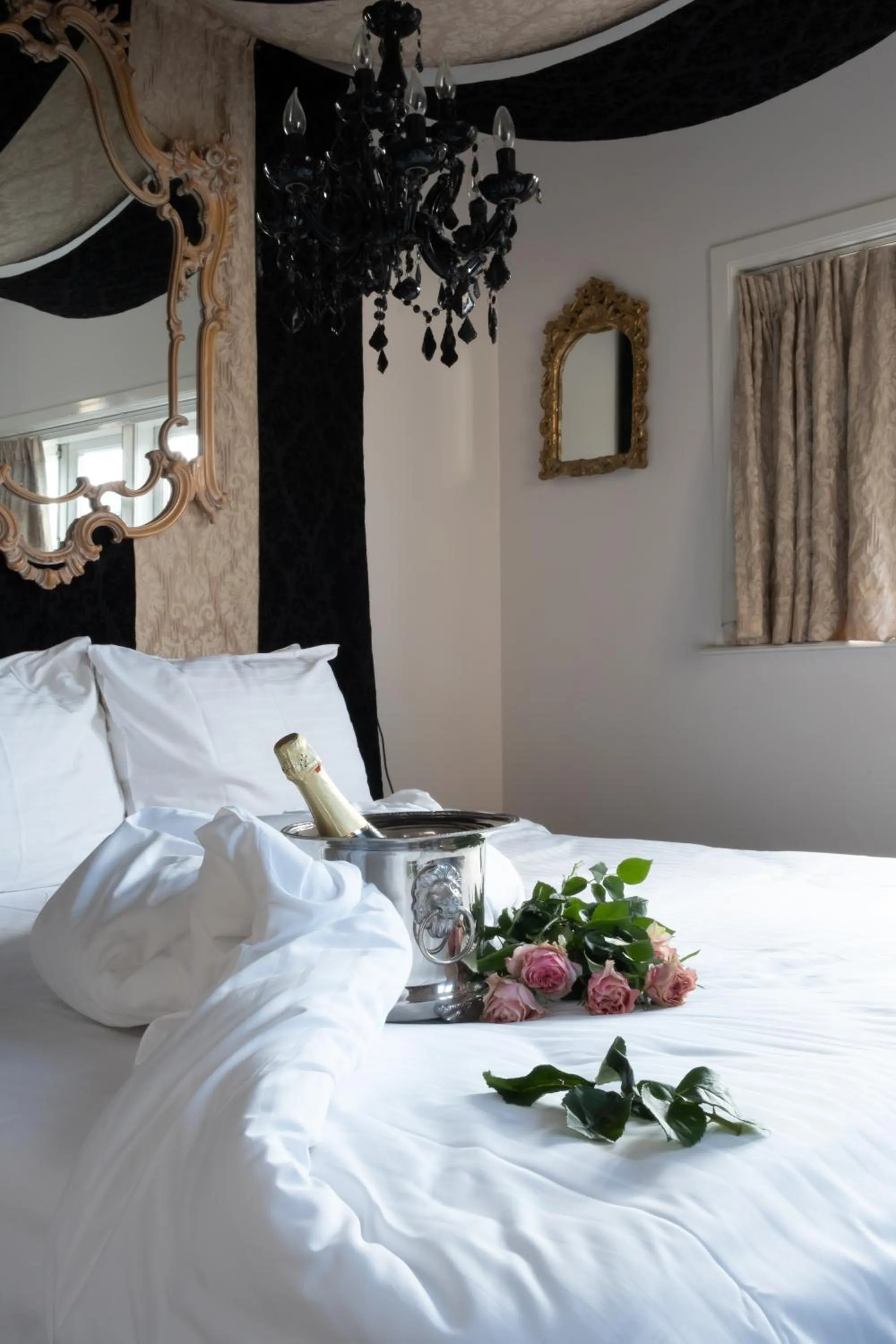 Bed in Rosalia's Menagerie Cocktail bar & InnUpstairs