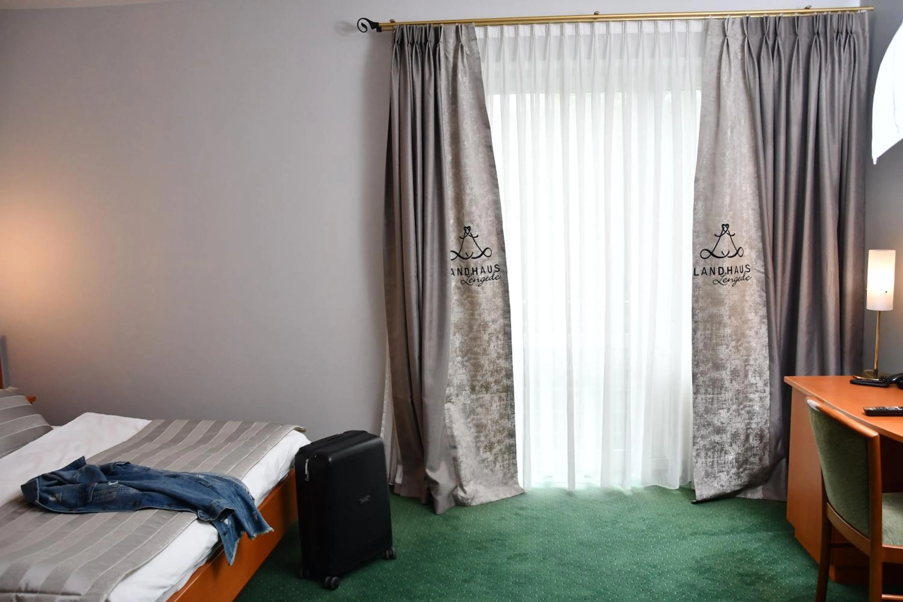 Photo of the whole room, Bed in LANDHAUS LENGEDE Hotel