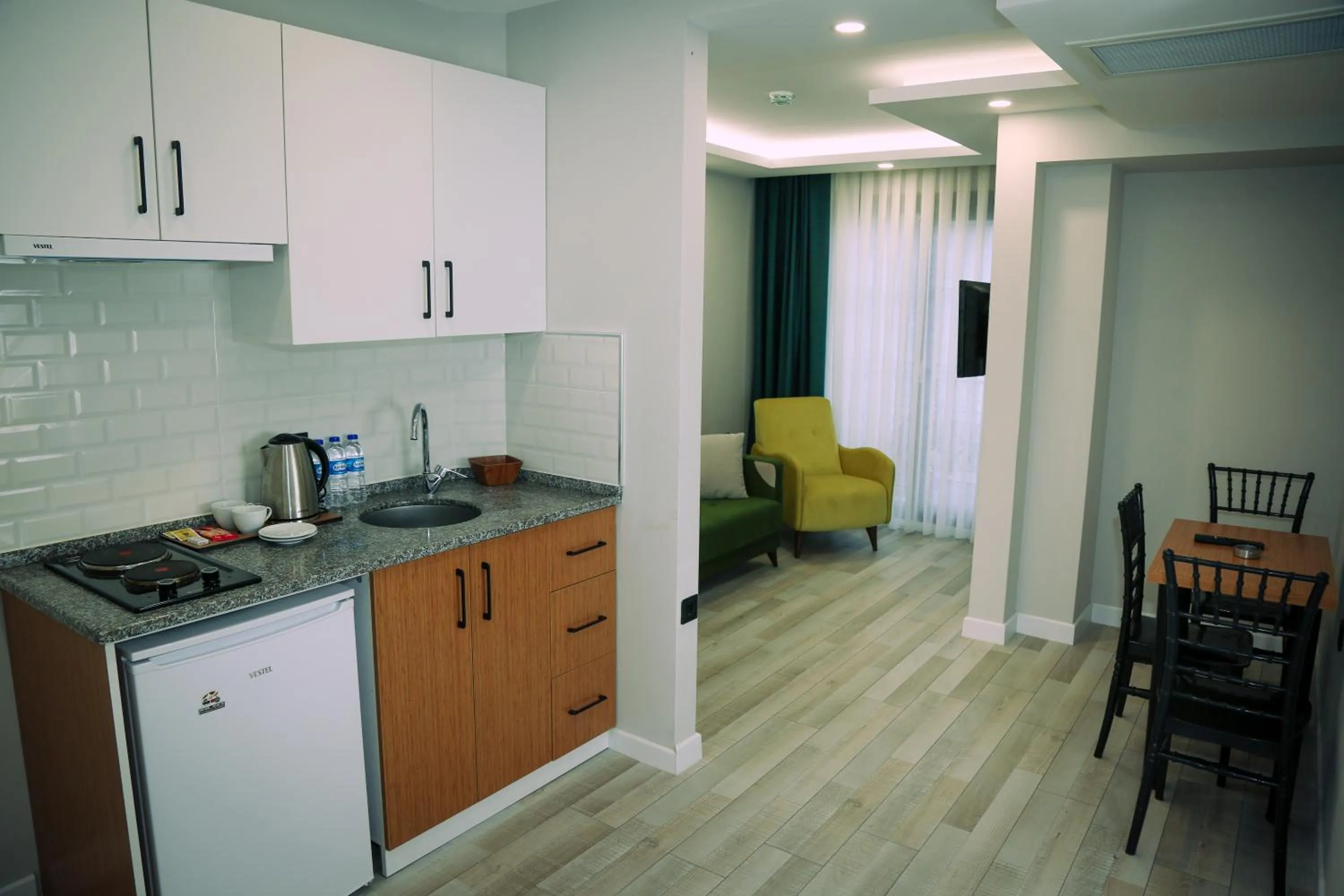 Kitchen or kitchenette in White Golden Suite Hotel
