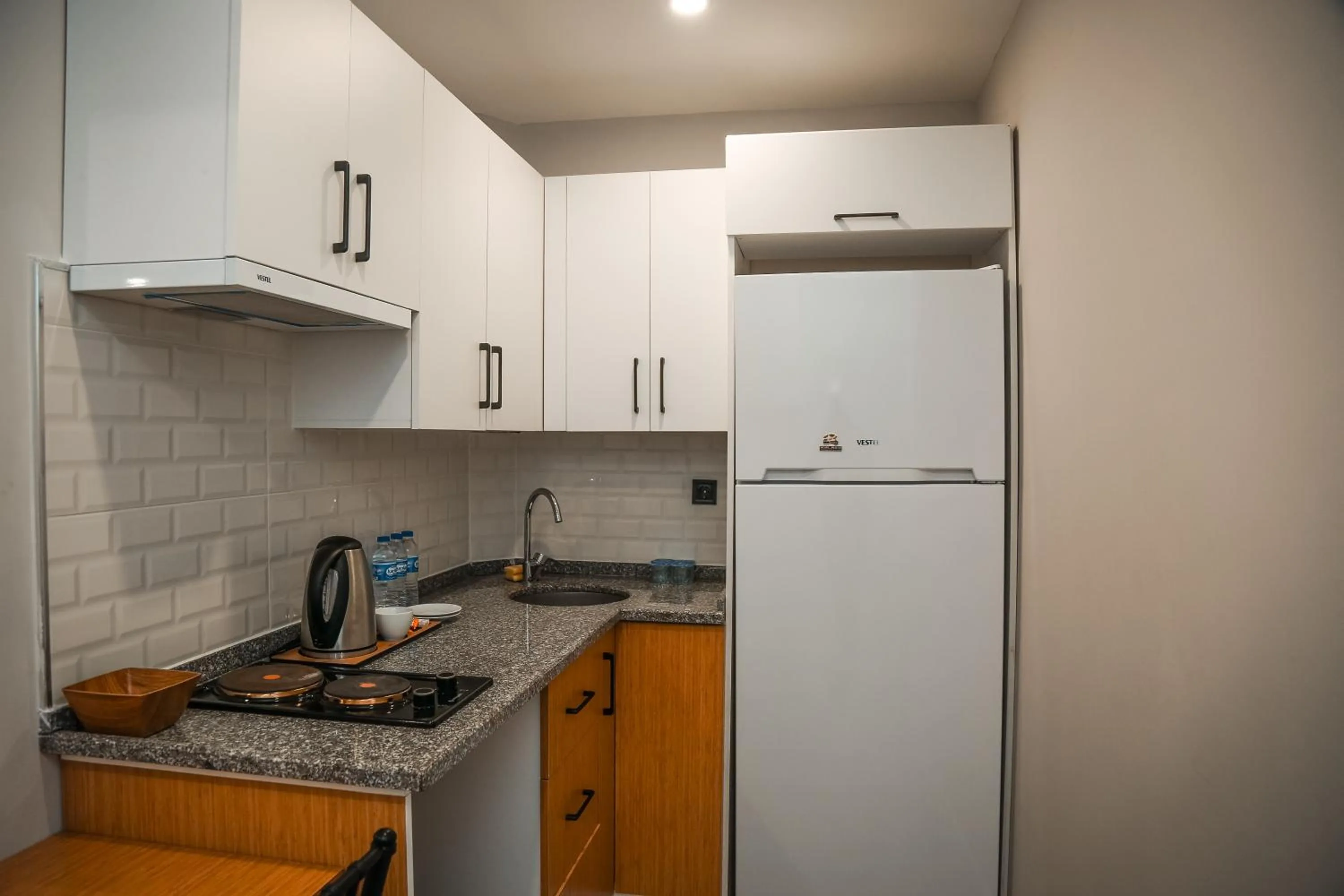 Kitchen or kitchenette in White Golden Suite Hotel