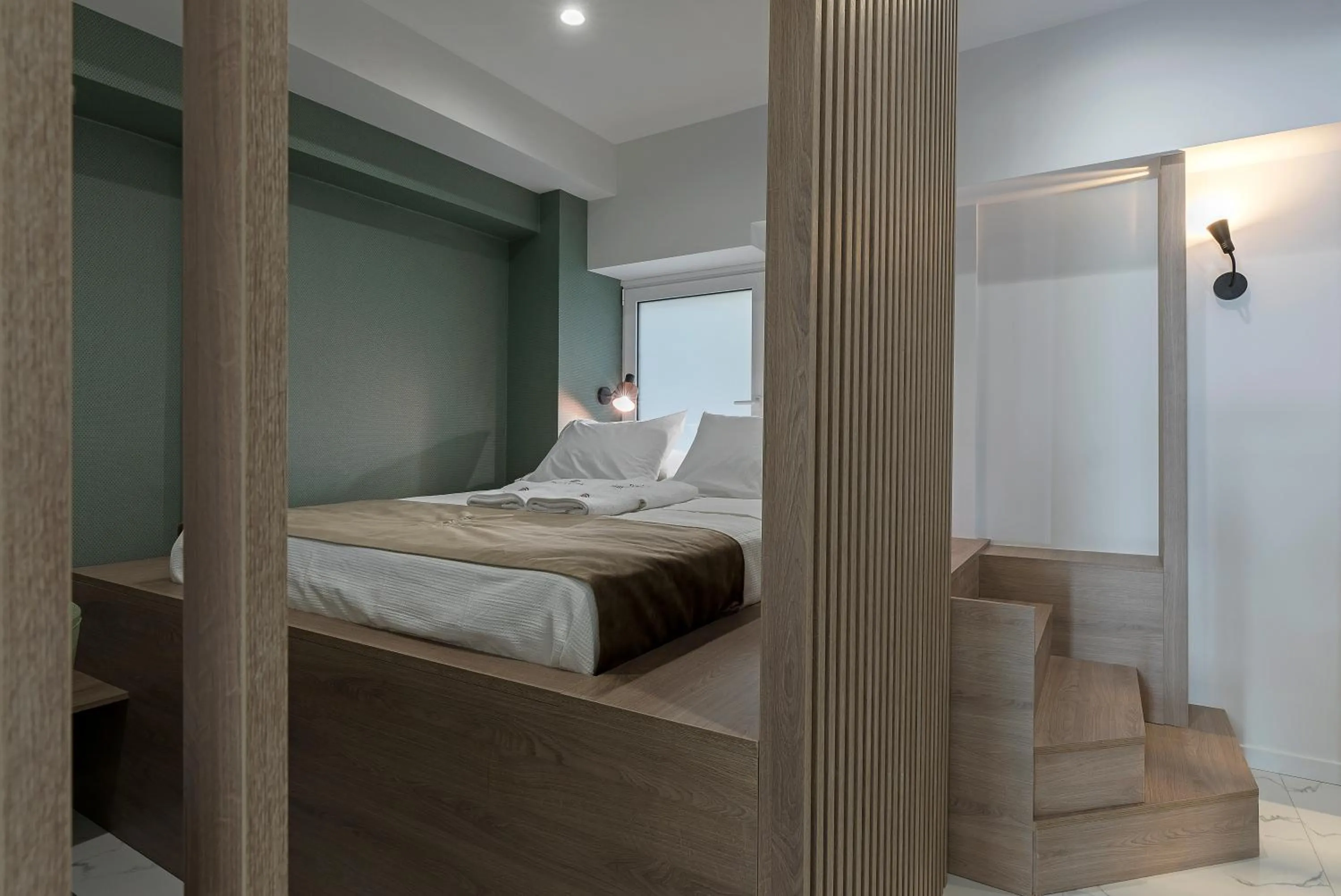 Bed in Philosofia Athens Suites