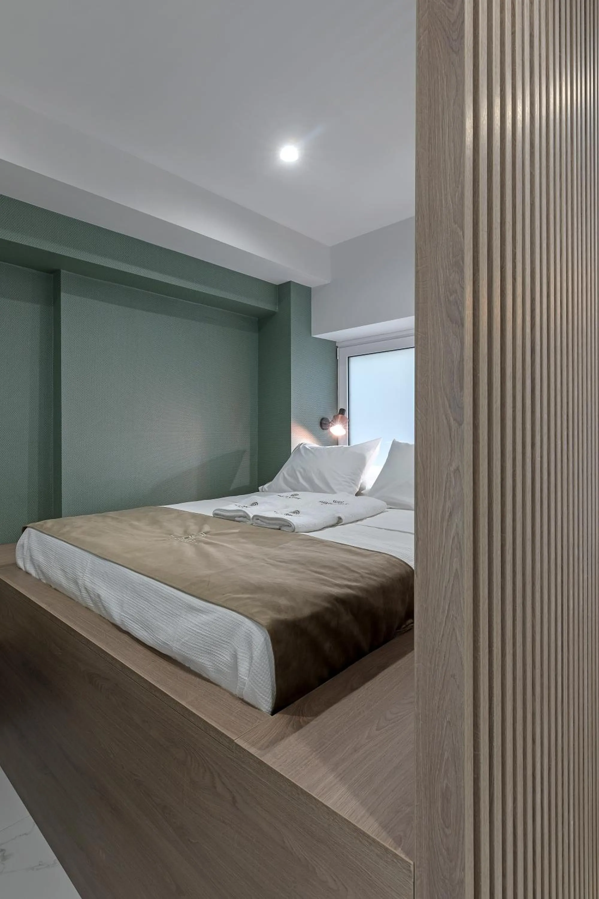 Bed in Philosofia Athens Suites