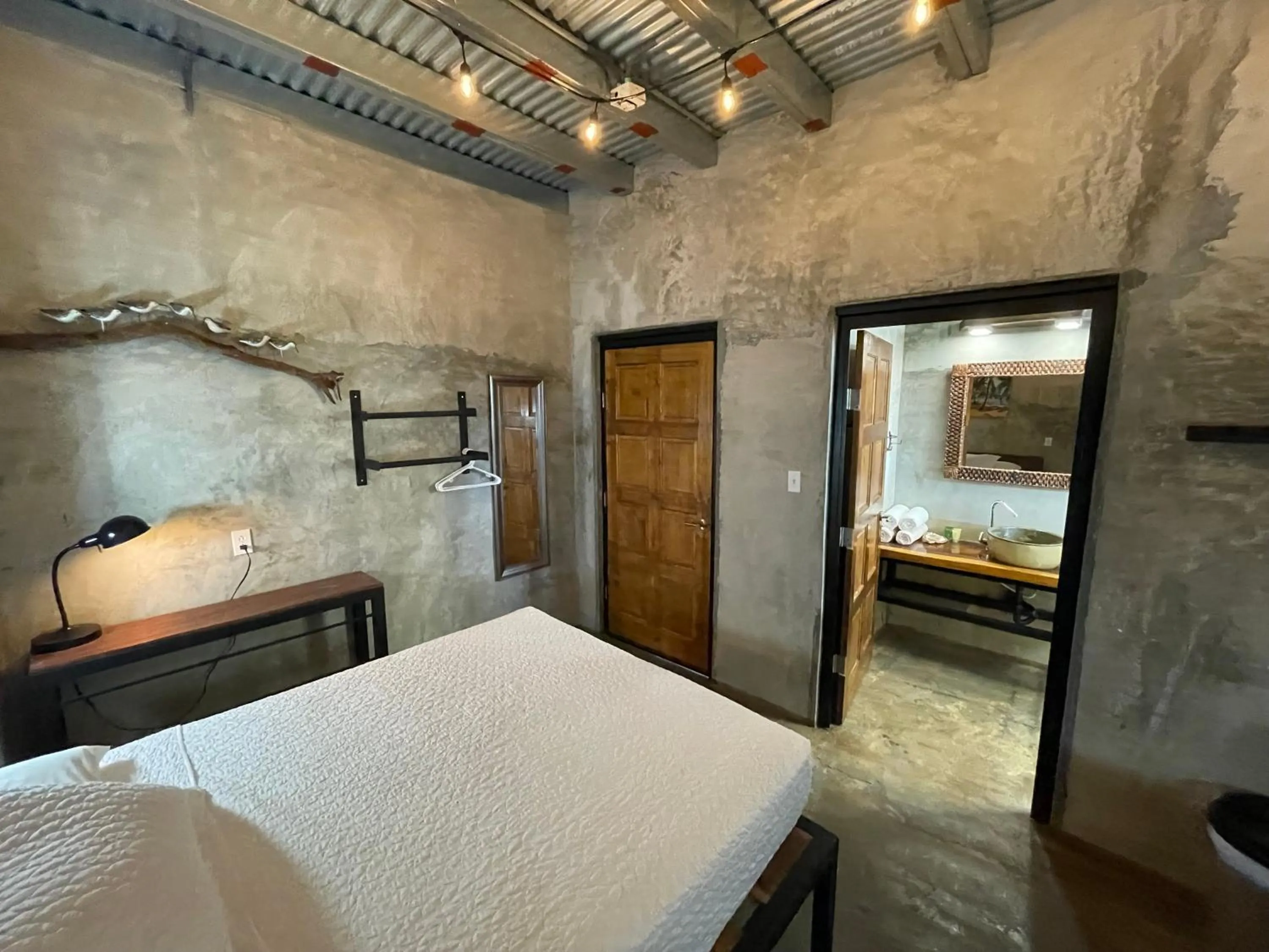 Bed in San Carlos Surf Resort & Eco Lodge