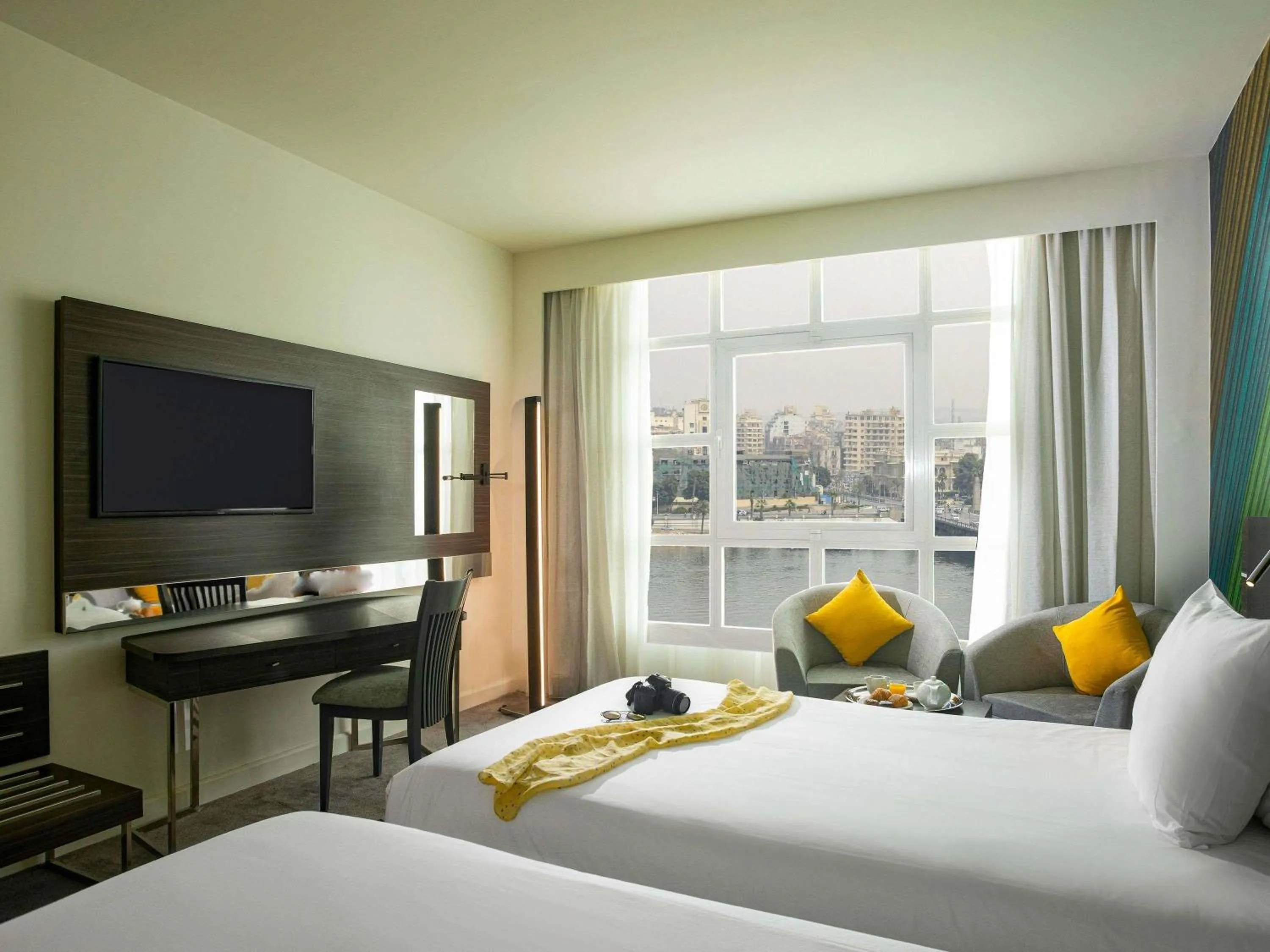 Property building, Bed in Novotel Cairo El Borg