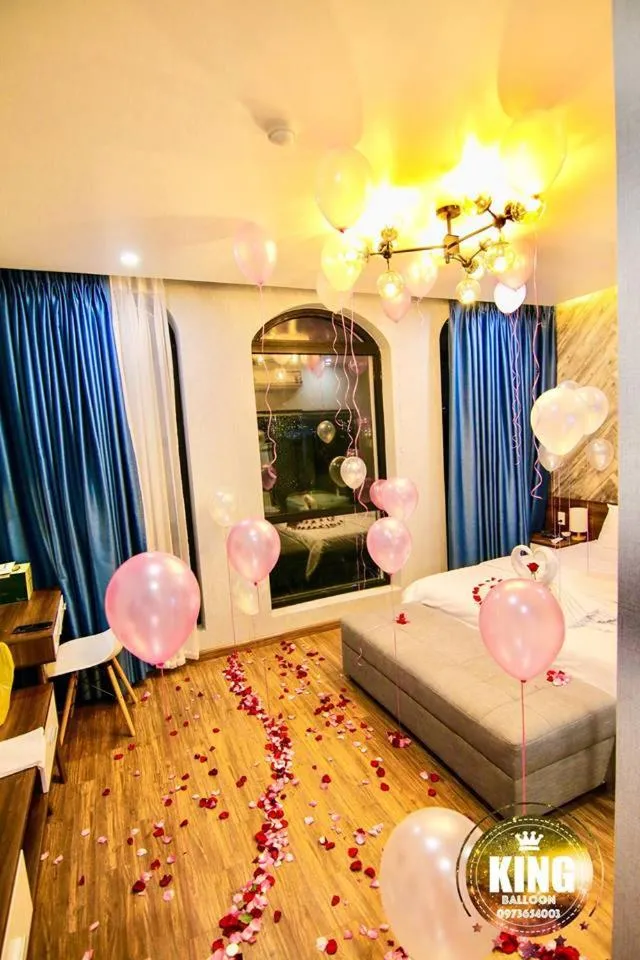 Living room, Bed in La Galerie Hotel