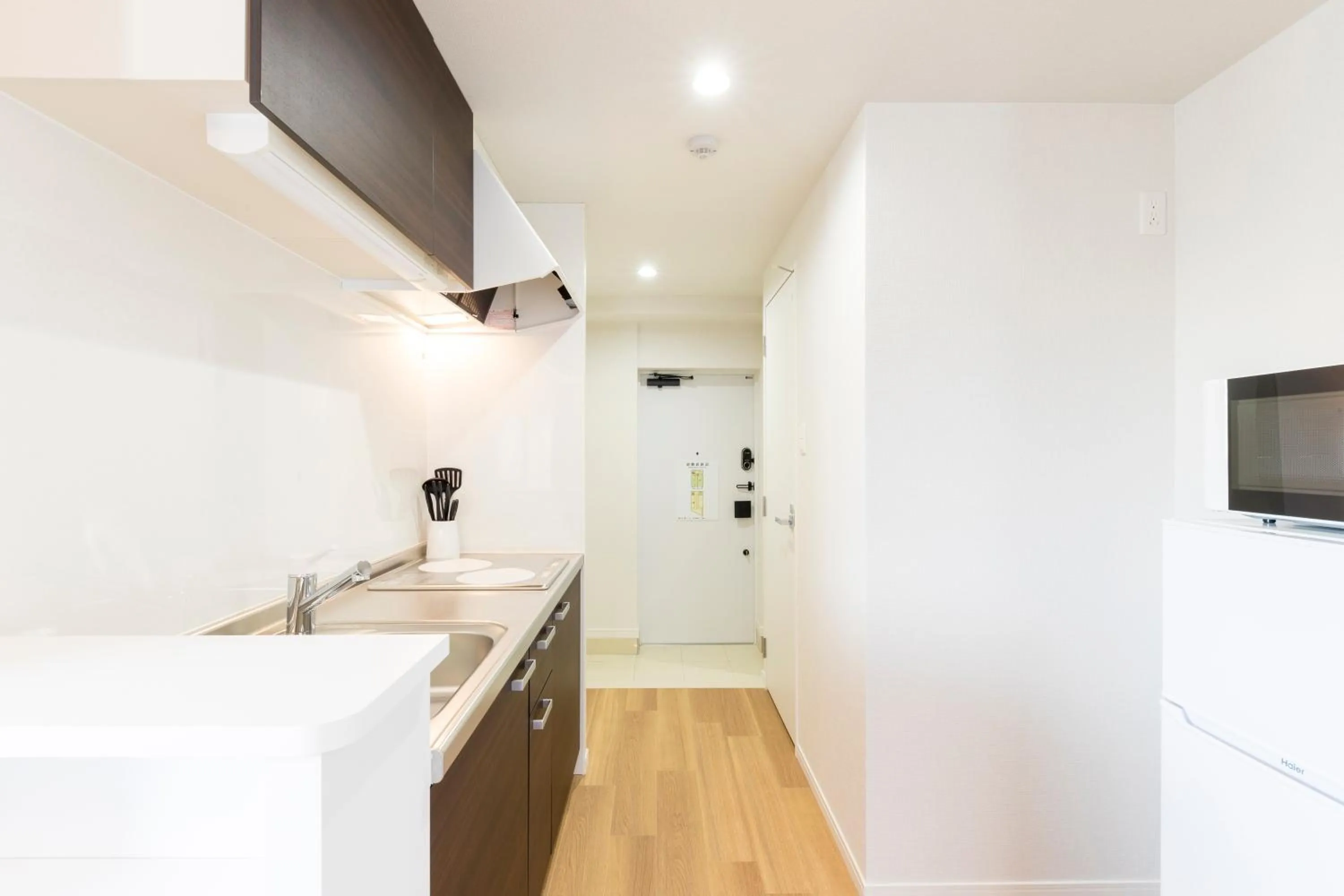 Kitchen or kitchenette in SG Residence Inn Hakataekiminami