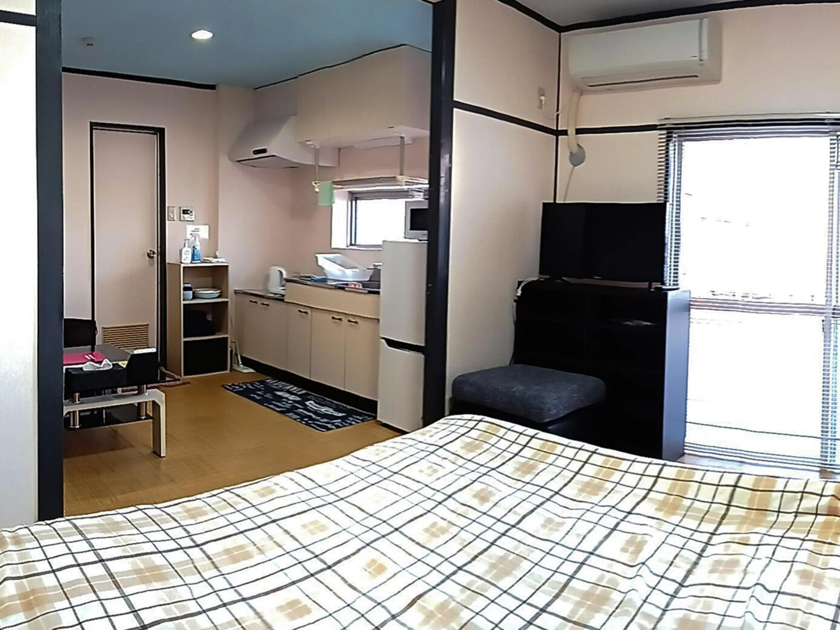 Photo of the whole room, Bed in Calm house Beppukitahama