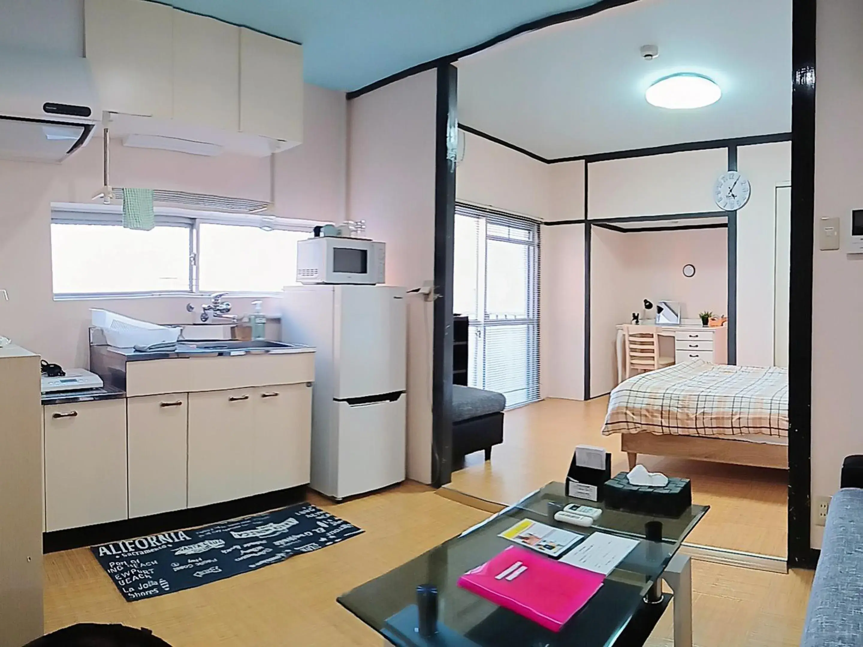 Living room, Bed in Calm house Beppukitahama Living room, Bed in Calm house Beppukitahama