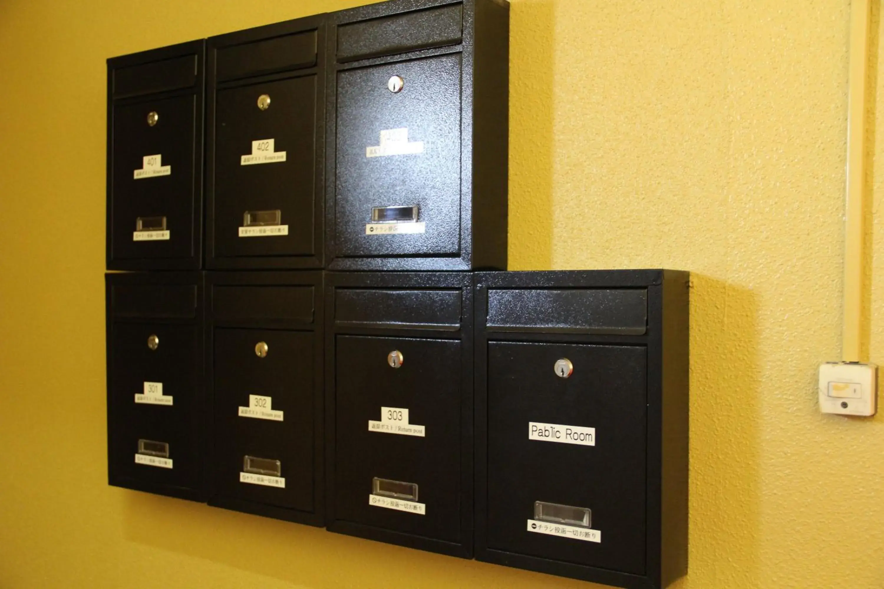 Facade/entrance in Calm house Beppukitahama Facade/entrance in Calm house Beppukitahama