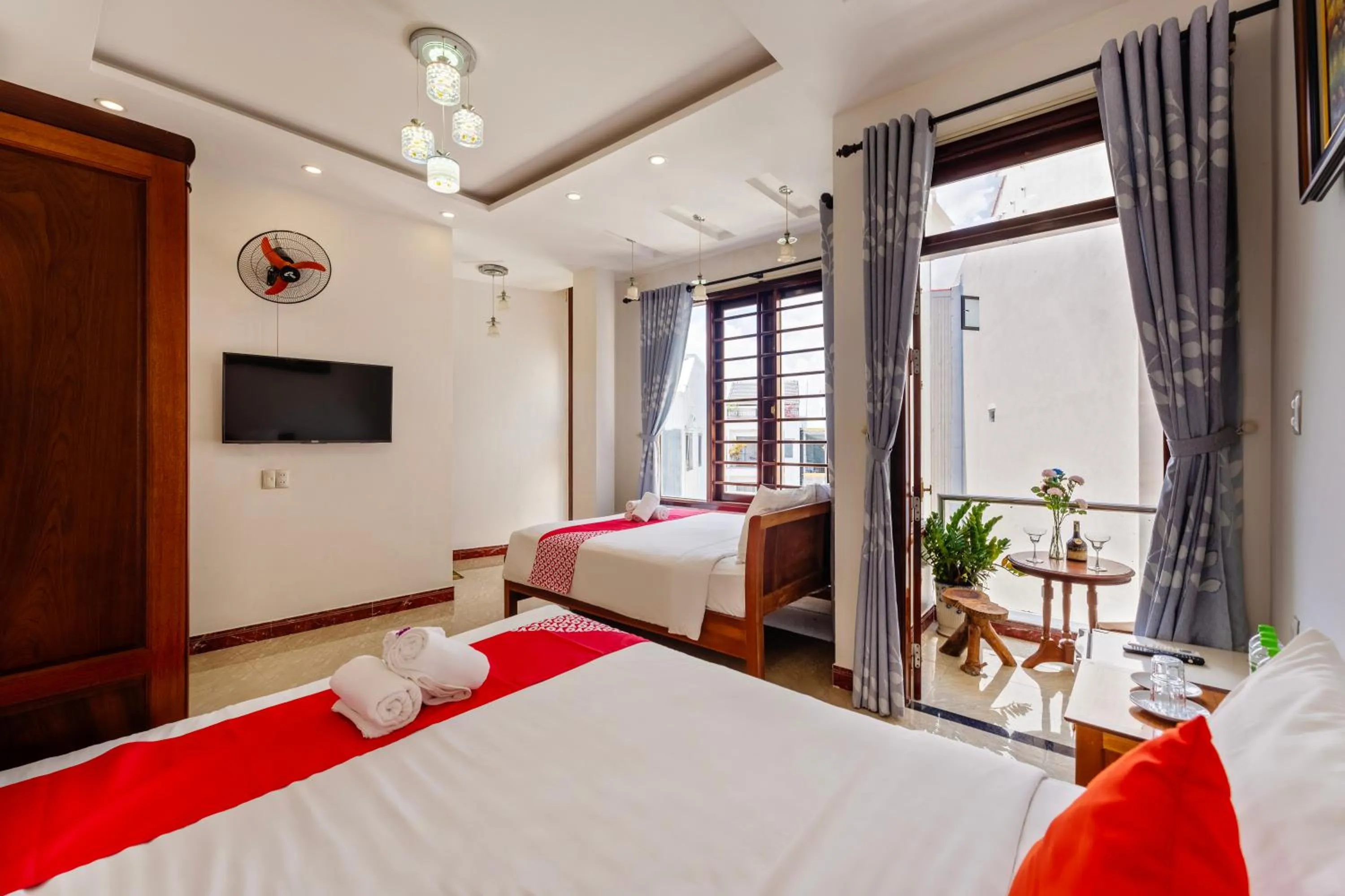 Communal lounge/ TV room, Bed in Hoi An Legend Connect Villa