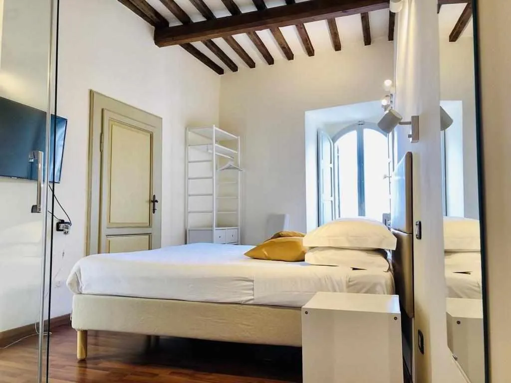 Bed in Mavitur Rooms Assisi
