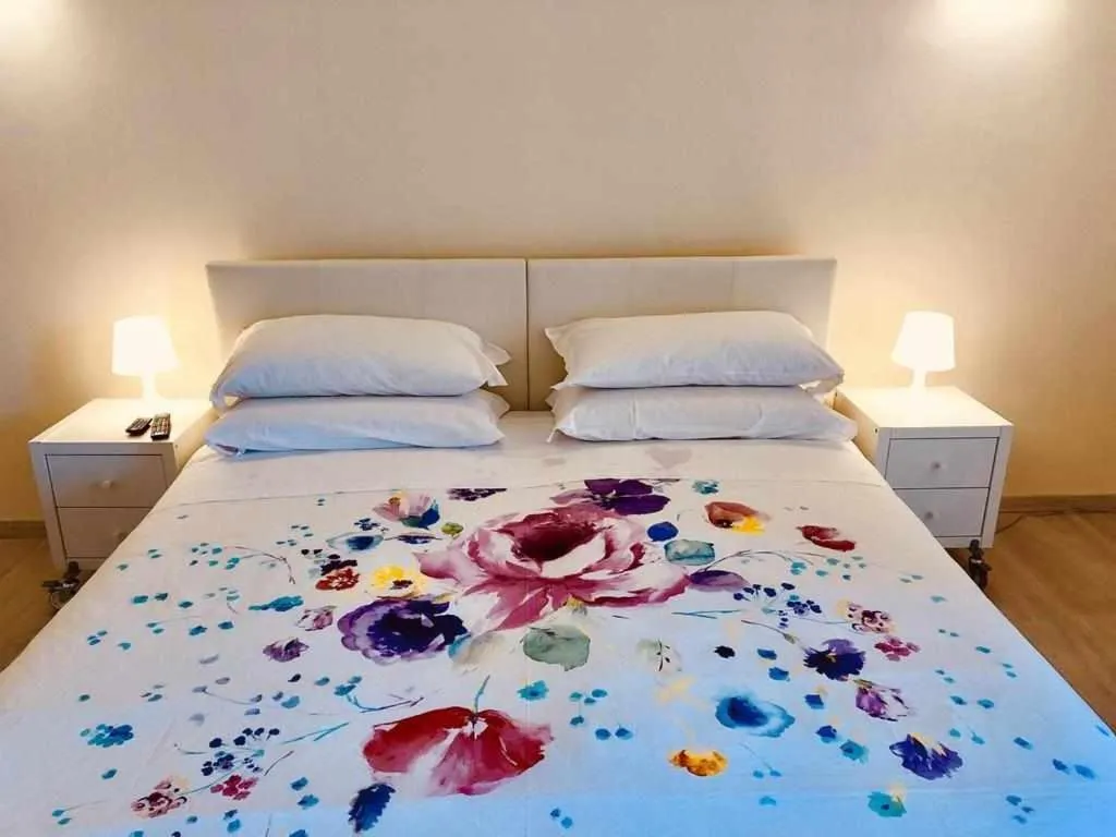 Bed in Mavitur Rooms Assisi