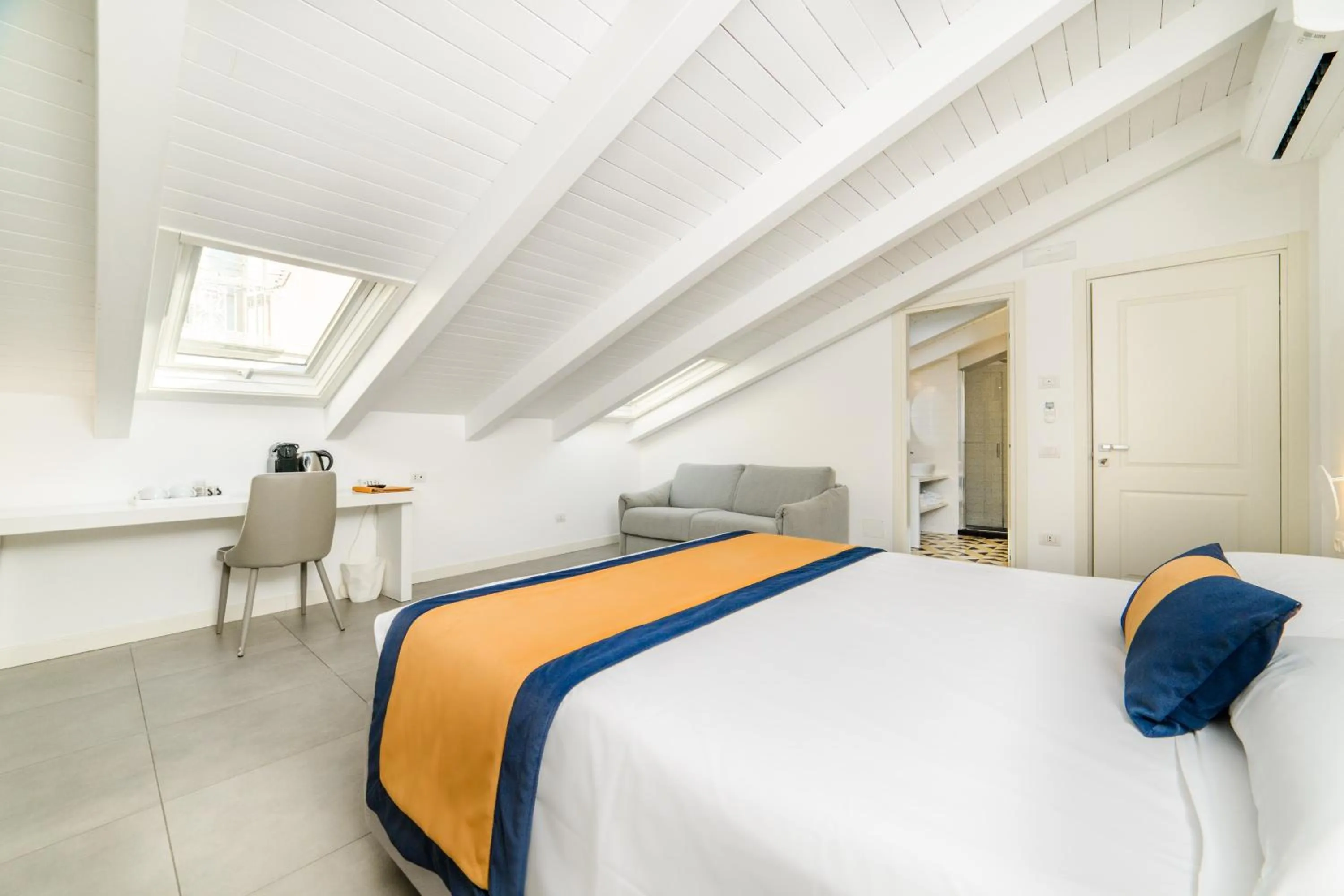 Bed in Zia Pupetta Suites