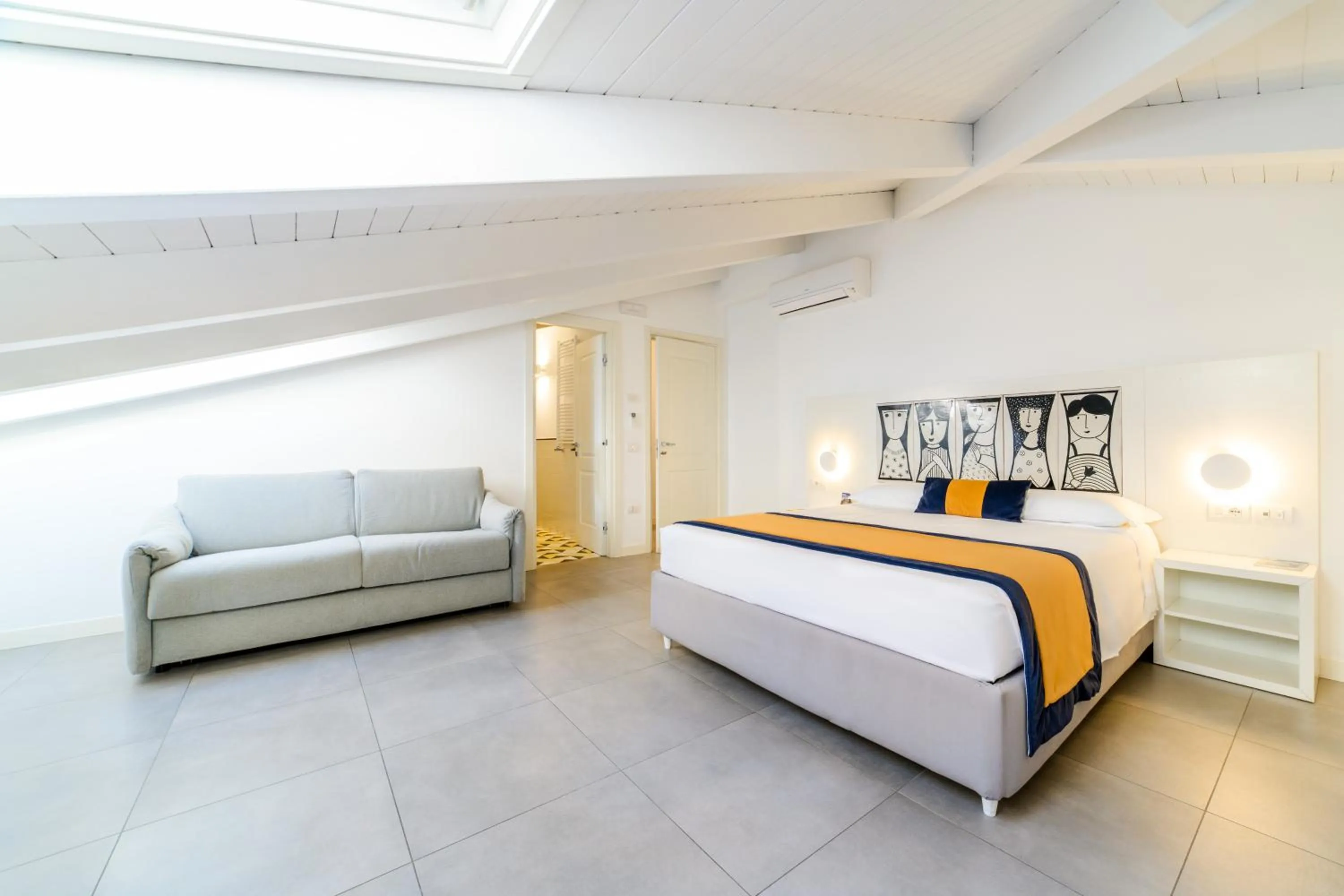 Bed in Zia Pupetta Suites