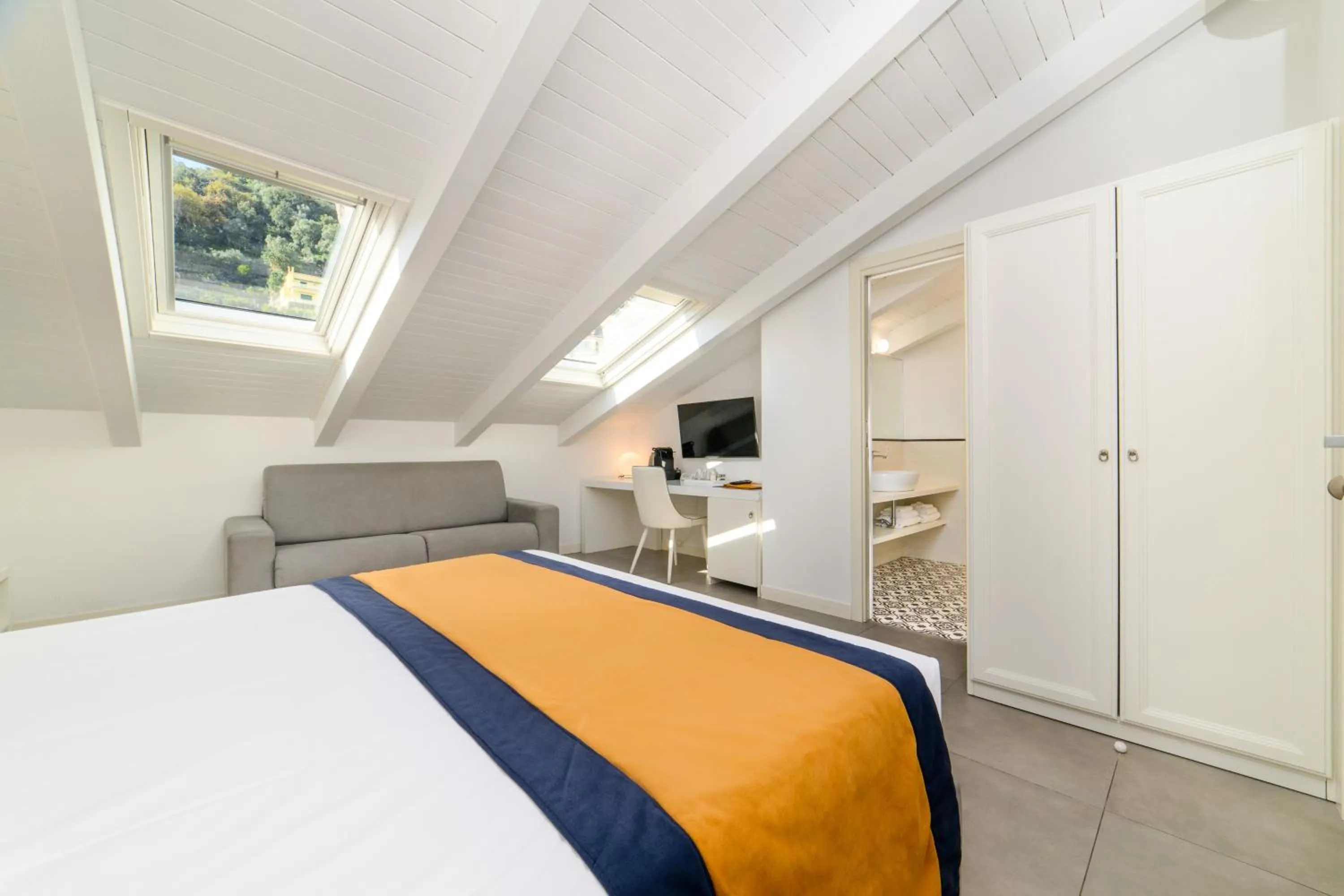 Bed in Zia Pupetta Suites