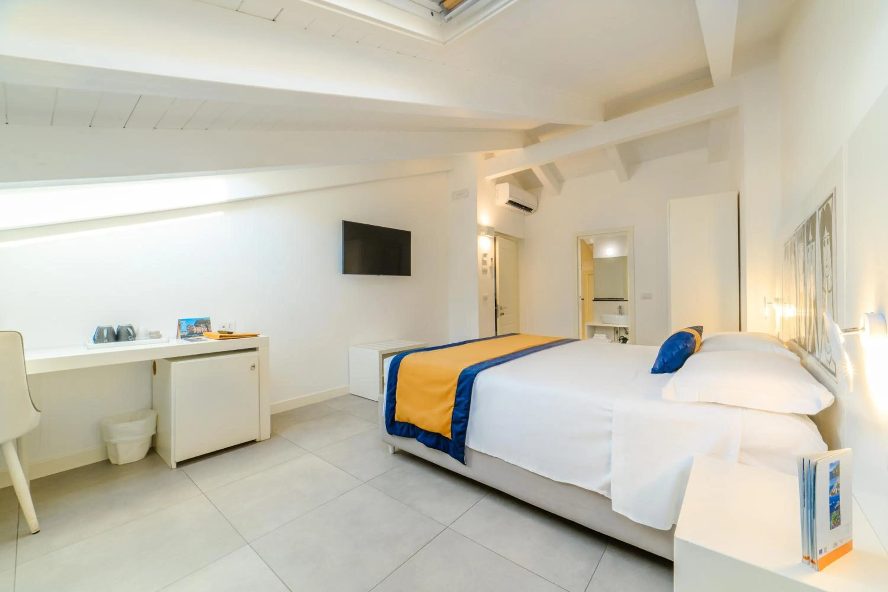 Bed in Zia Pupetta Suites