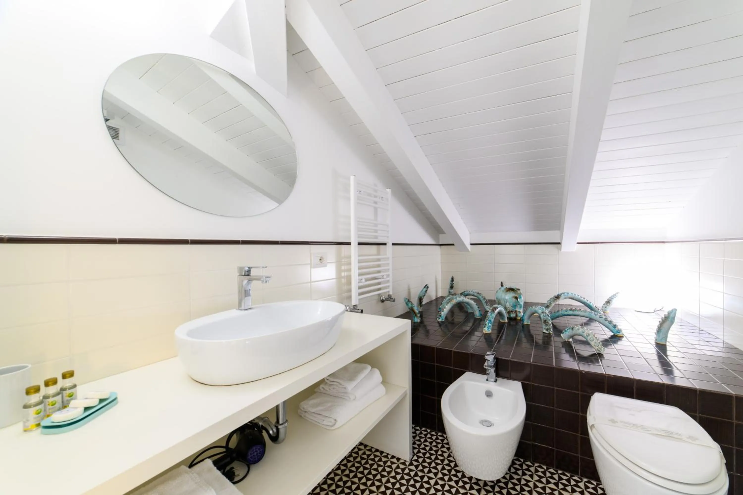 Toilet in Zia Pupetta Suites