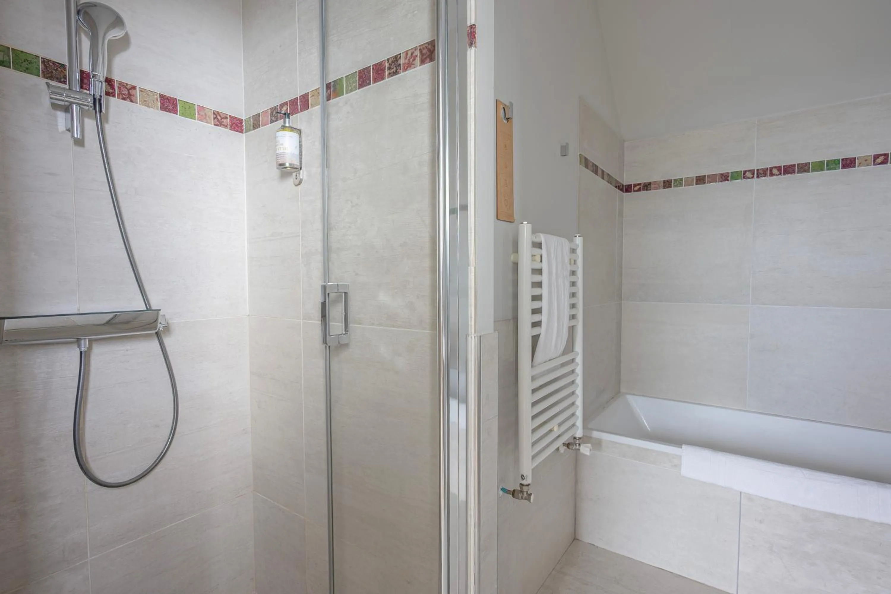 Shower in Logis Le Château de Sable