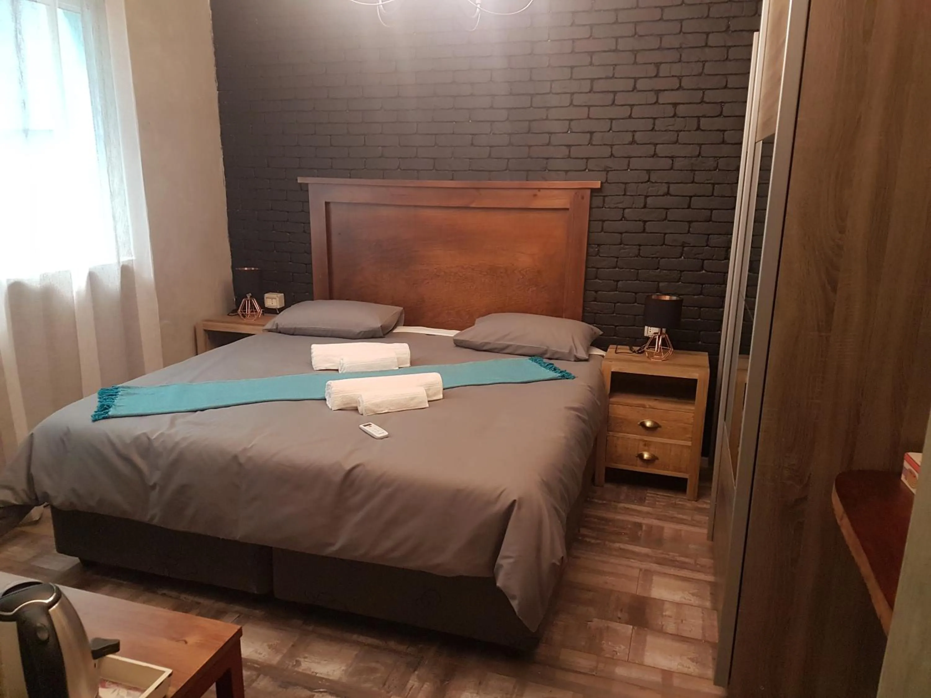 Photo of the whole room, Bed in The Mountains