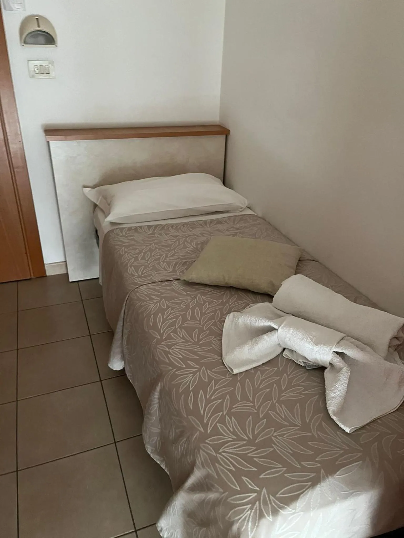 Bed in Hotel Vienna Rivazzurra