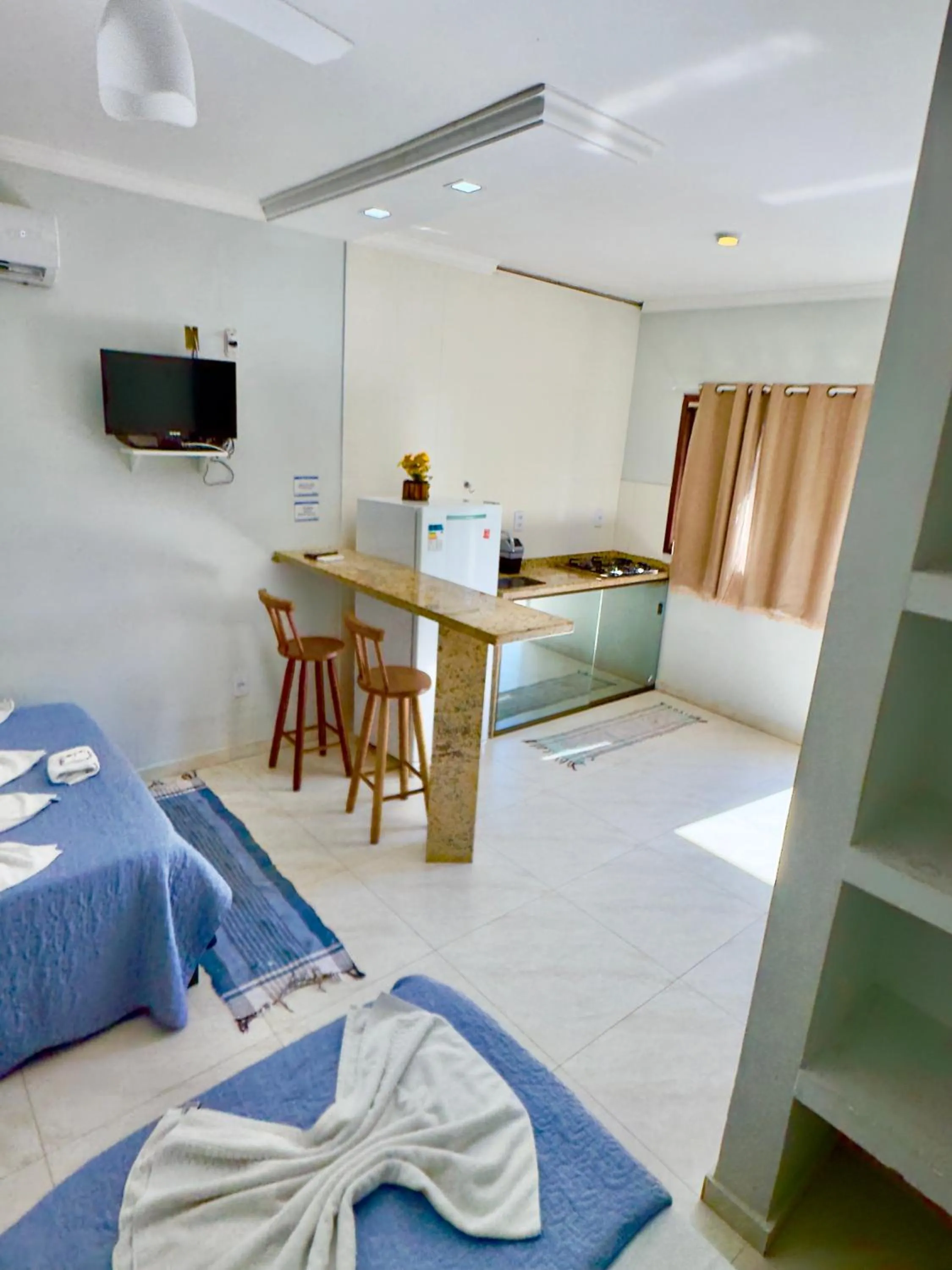 Bed in Pousada Três Pescadores