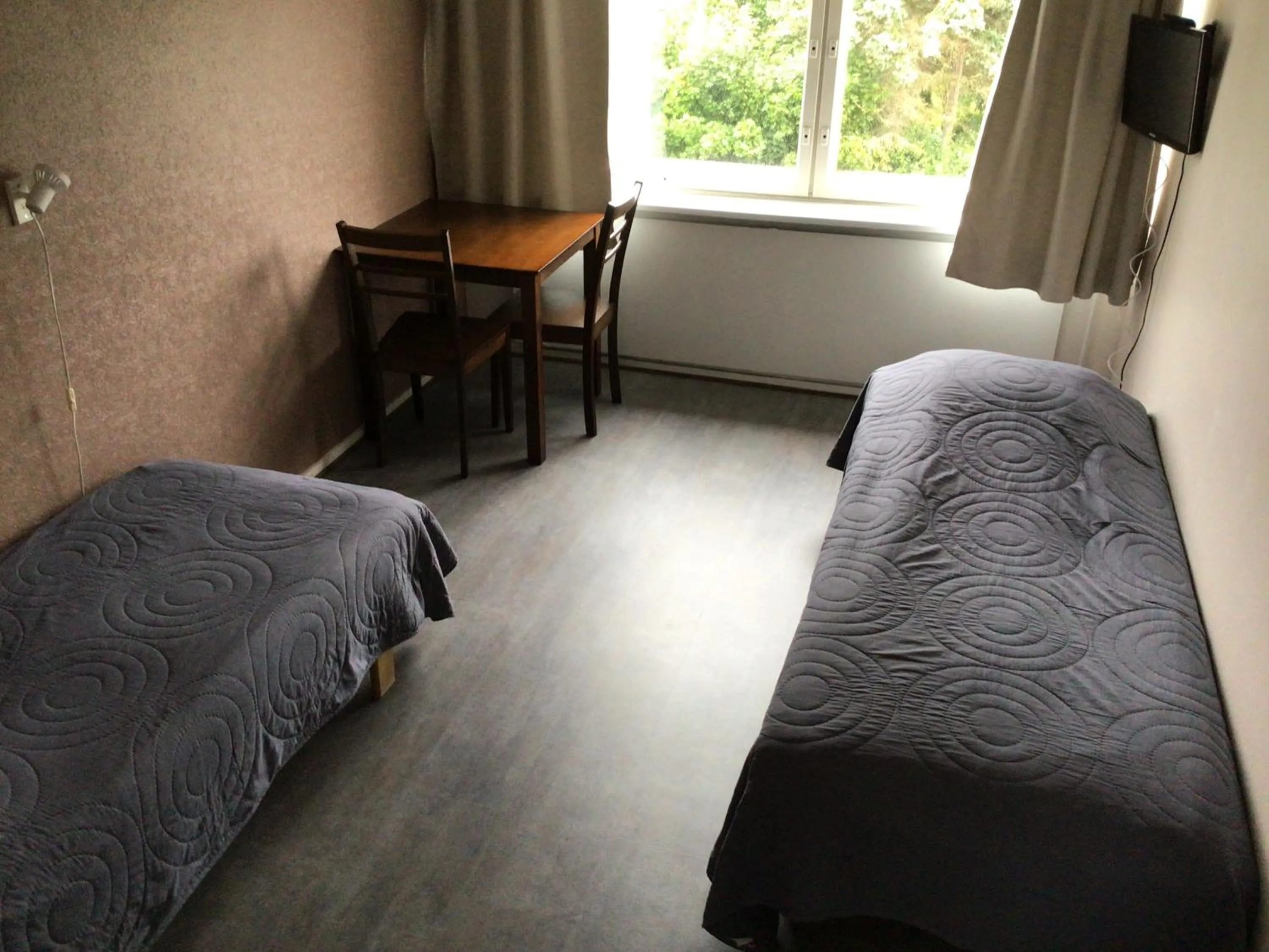 Bed in Leo Hotelli