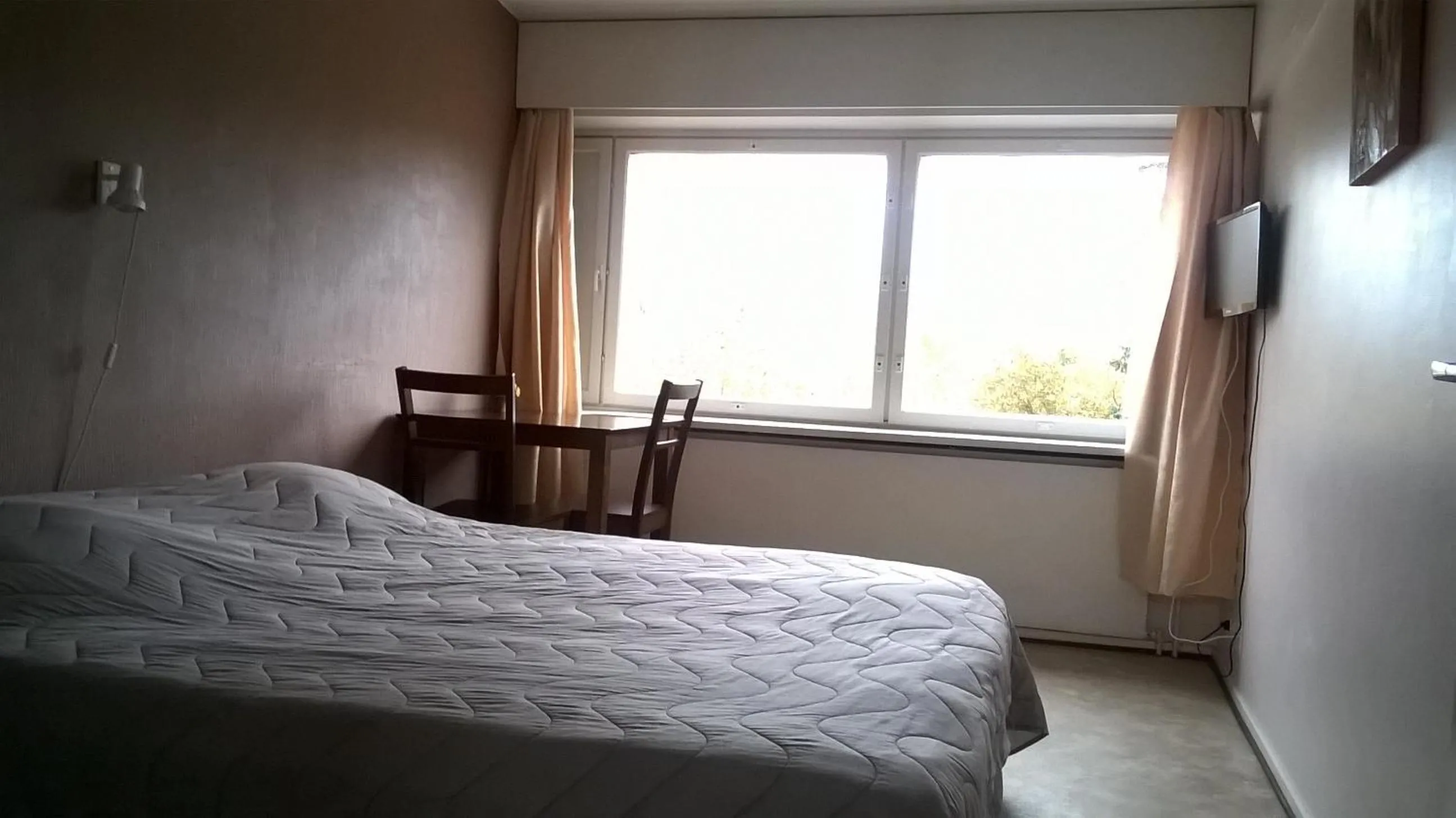 Photo of the whole room, Bed in Leo Hotelli